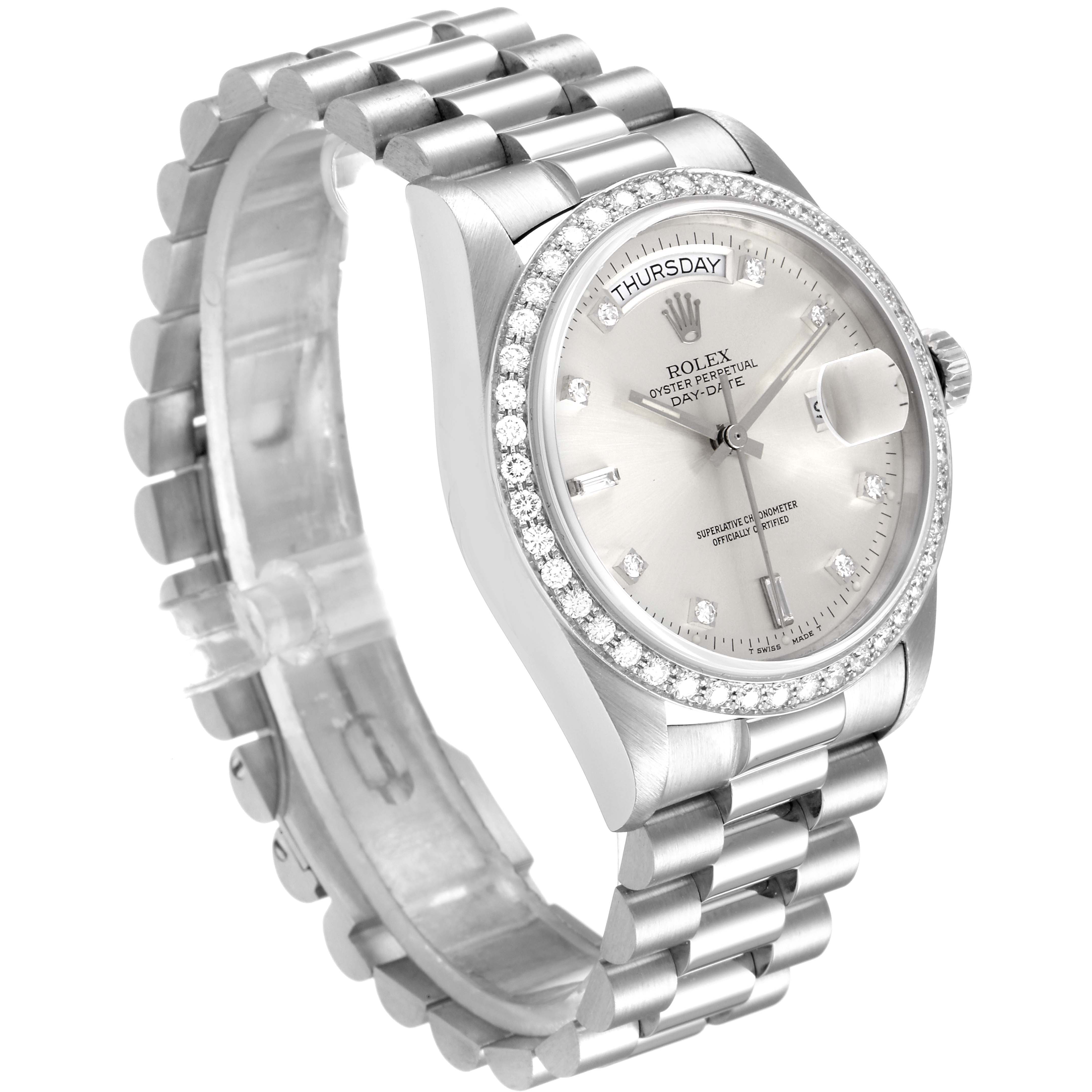 The Rolex President 18049 Men
s White Gold Silver Dial 18049 Men
s White Gold Silver Dial model is shown at a slight angle, revealing its face, bezel with diamonds, and metal bracelet.