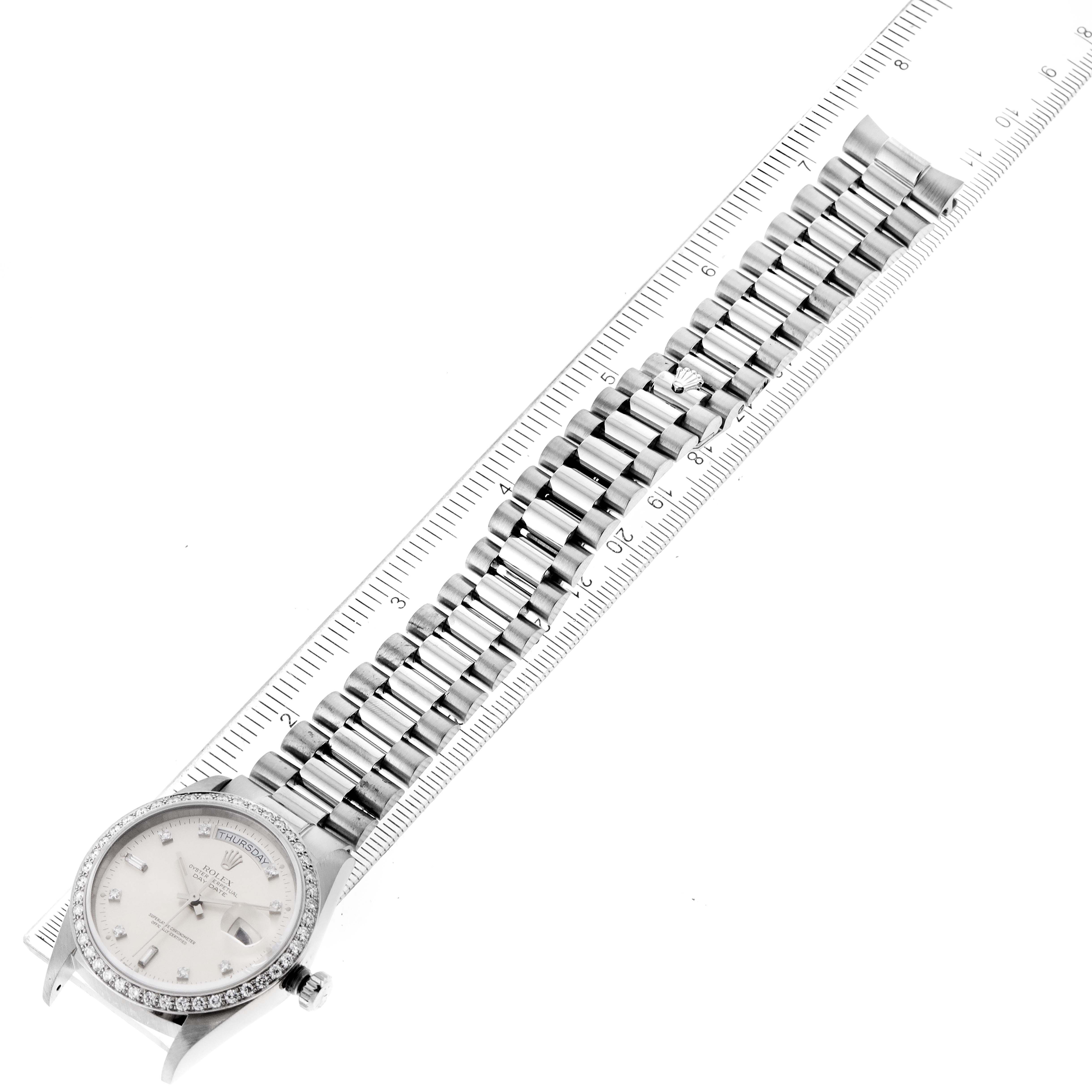 The image shows a top-down view of a Rolex President 18049 Men
s White Gold Silver Dial 18049 Men
s White Gold Silver Dial model watch, highlighting the dial and bracelet alongside a measuring ruler.