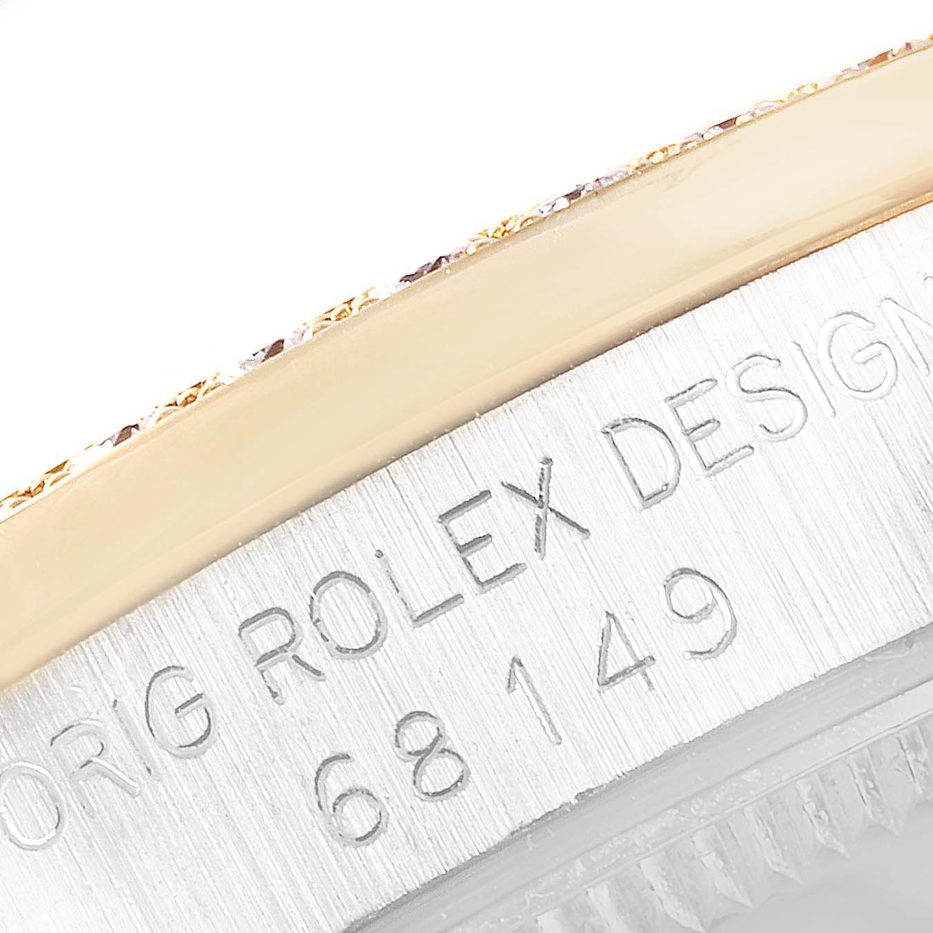 This image shows a close-up of the case edge and engraved model number on a Rolex President 68149 Women's White Gold Brown Dial 68149 Women's White Gold Brown Dial watch.