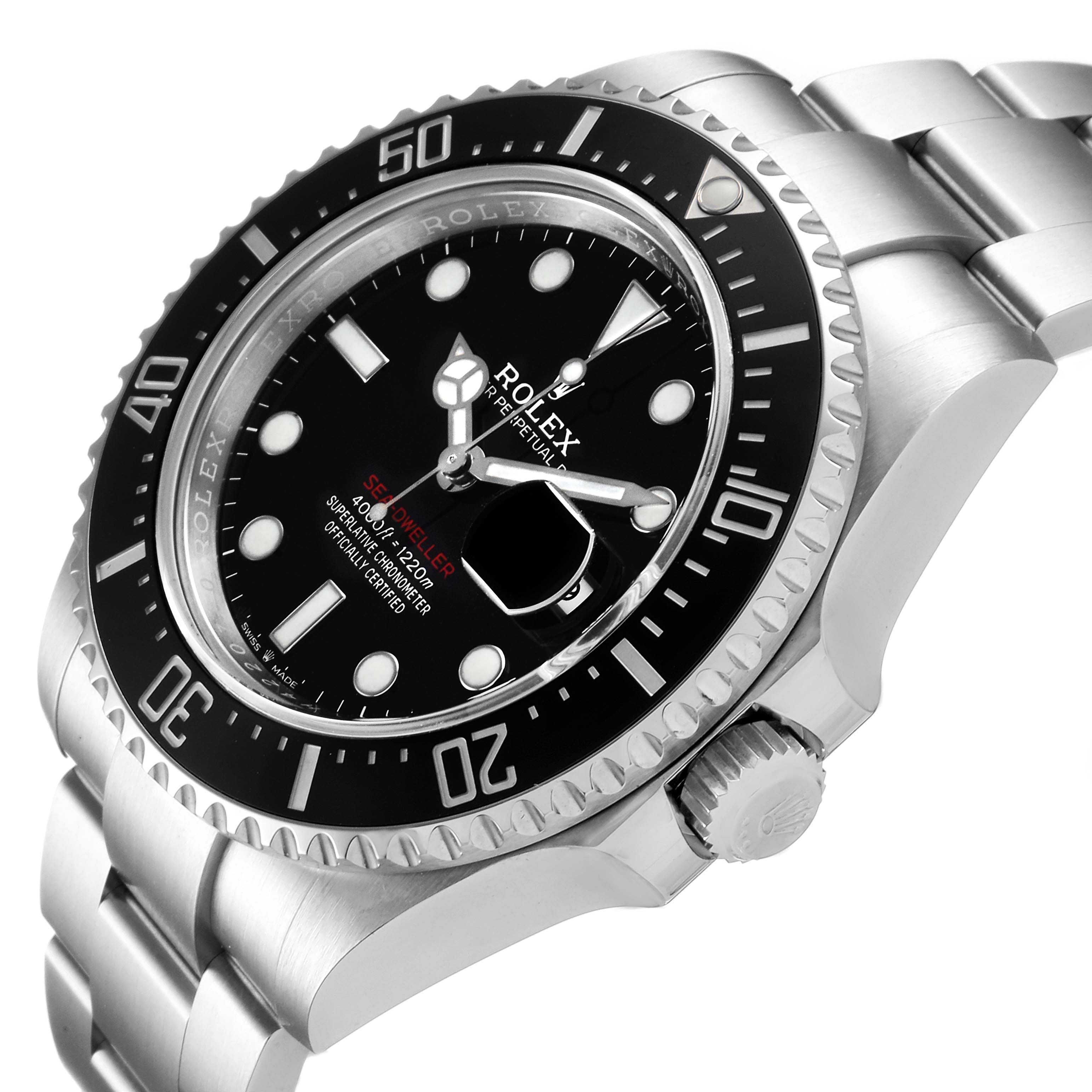 The image shows a Rolex Sea-Dweller 126600 Men
s Stainless Steel Black Dial 126600 Men
s Stainless Steel Black Dial watch from an angled side view, highlighting the face, bezel, and bracelet.