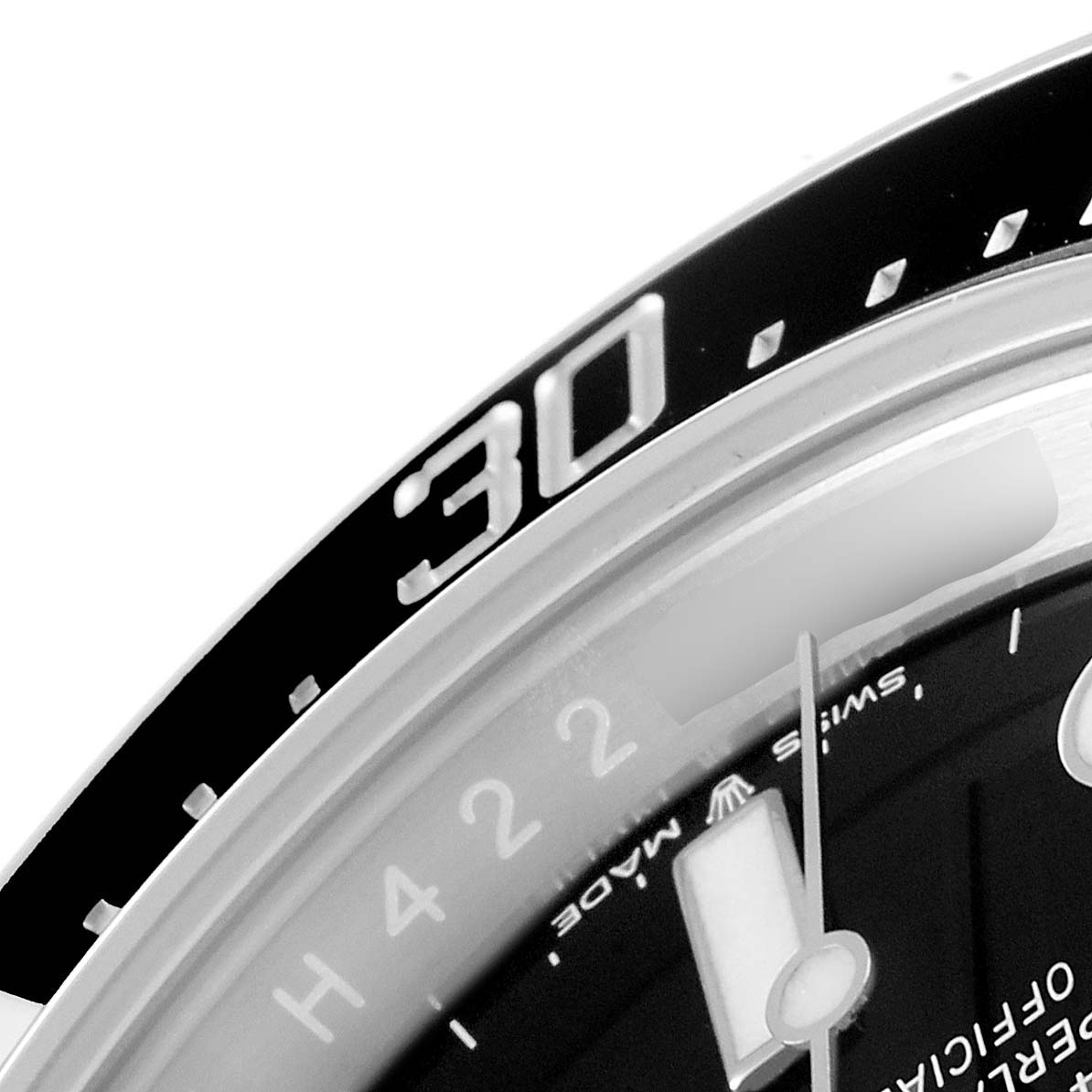 The image shows a close-up of the bezel and part of the dial of a Rolex Sea-Dweller 126600 Men
s Stainless Steel Black Dial 126600 Men
s Stainless Steel Black Dial watch, focusing on the "30" minute marker.