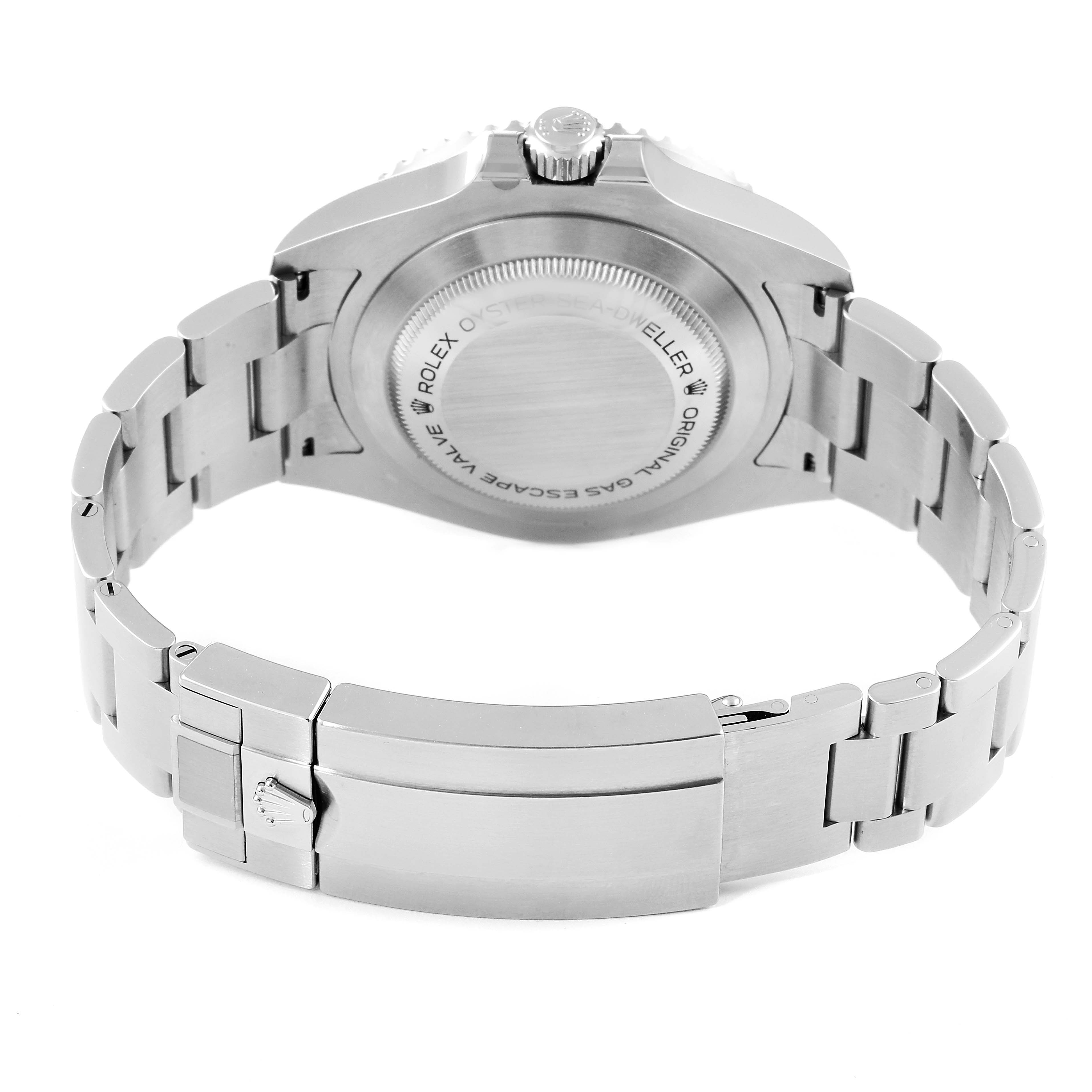 The image shows the back view of a Rolex Sea-Dweller 126600 Men
s Stainless Steel Black Dial 126600 Men
s Stainless Steel Black Dial watch, highlighting the case back and bracelet clasp.
