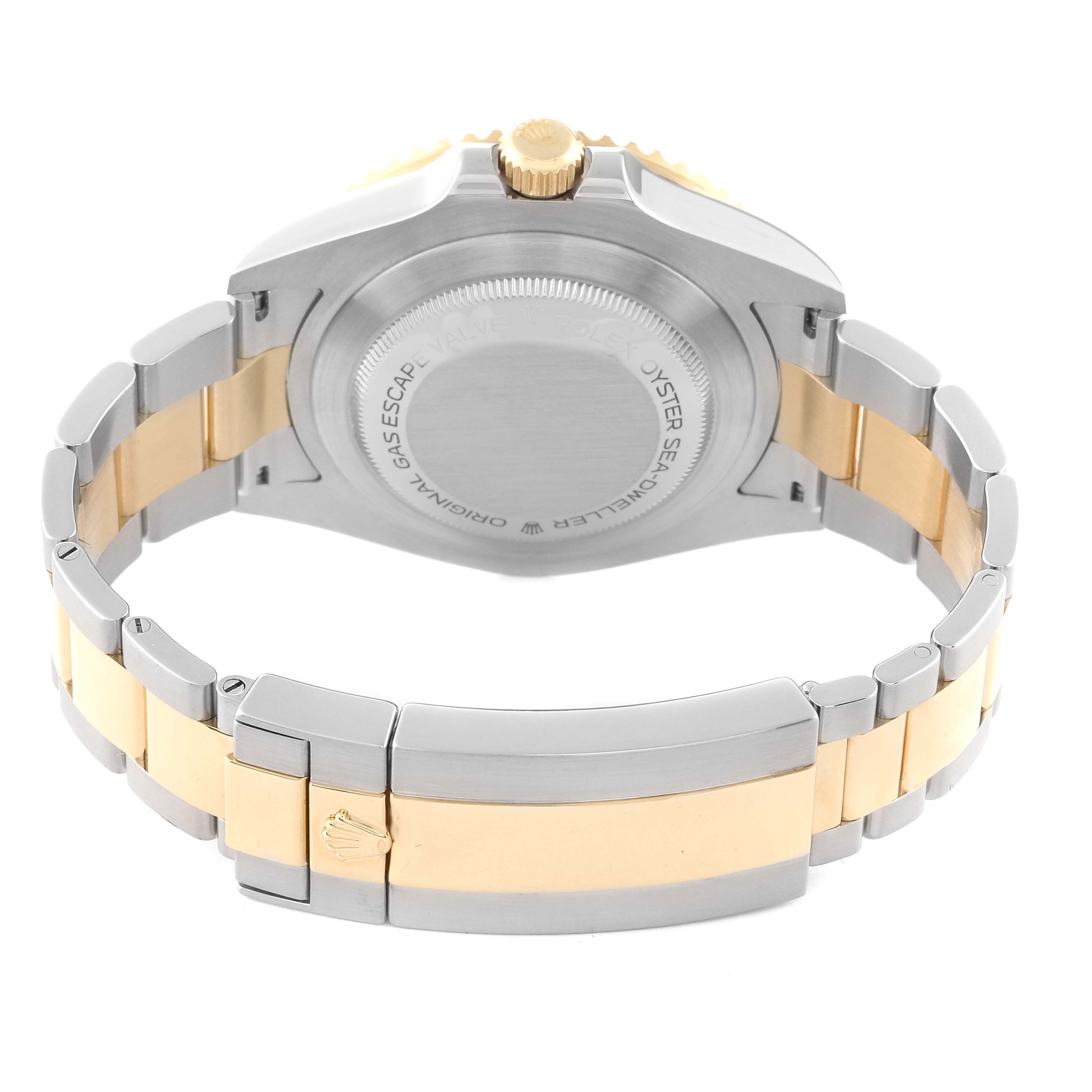 The image shows the back of a Rolex Sea-Dweller 126603 Men's Steel and Gold (two tone) Black Dial 126603 Men's Steel and Gold (two tone) Black Dial watch, highlighting its case back, crown, and two-tone bracelet with a clasp.