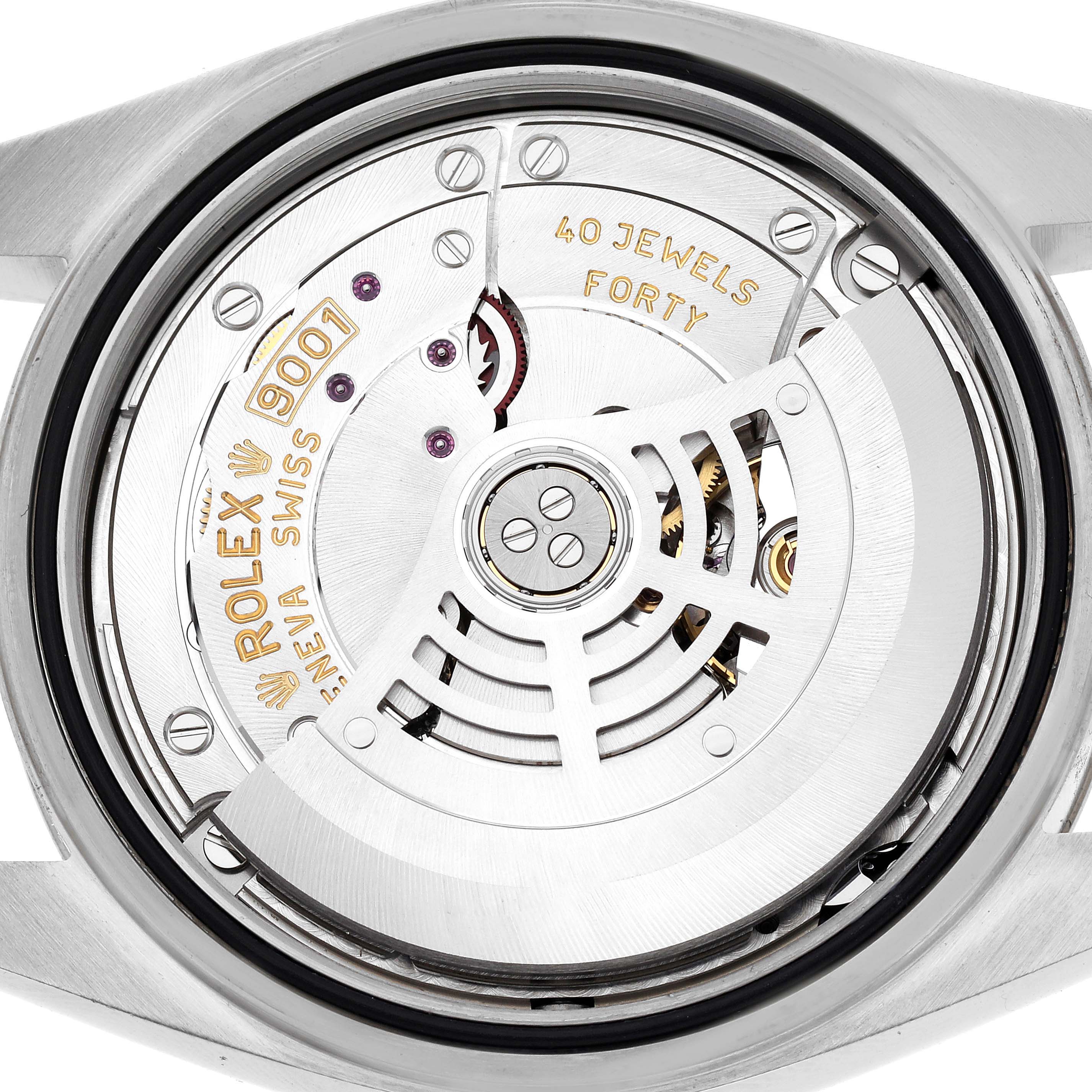 The image shows the Rolex Sky-Dweller 326934 Men
s Stainless Steel Silver Dial 326934 Men
s Stainless Steel Silver Dial
s movement and rotor components from a rear angle.