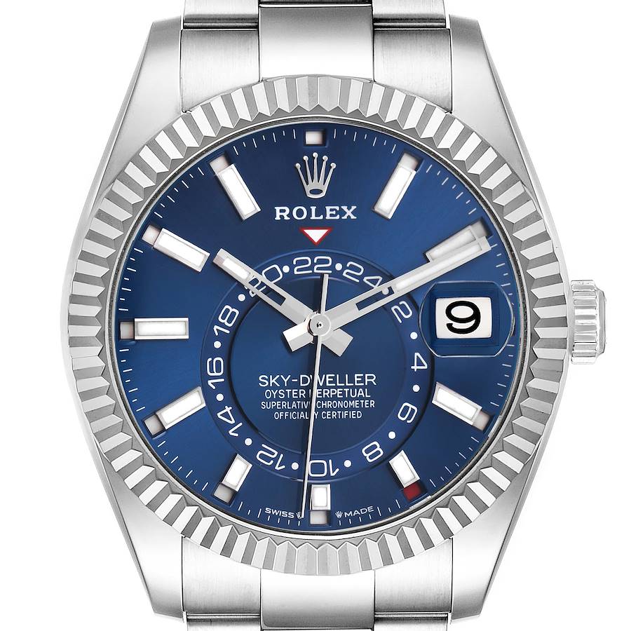The Rolex Sky-Dweller watch is shown from a front angle, highlighting its blue dial, bezel, and date display.