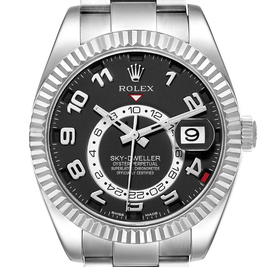 The Rolex Sky-Dweller is shown from a front angle, highlighting its dial, bezel, crown, and bracelet top section.
