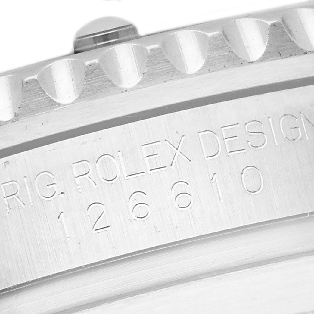 The image shows a close-up view of the side of the Rolex Submariner 126610 Men
s Stainless Steel Black Dial 126610 Men
s Stainless Steel Black Dial, highlighting the bezel and engraved model number.