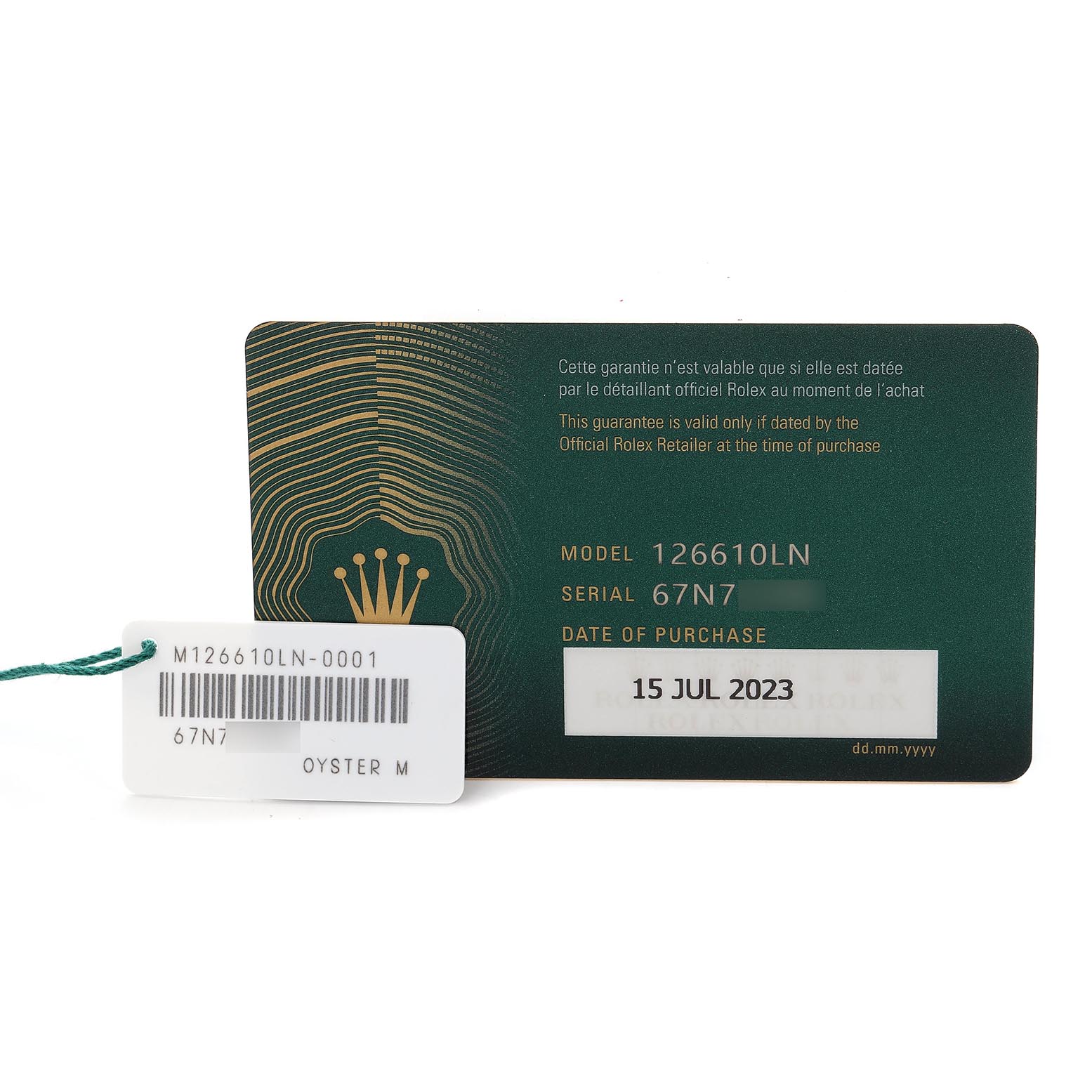 The image shows the warranty card and tag for a Rolex Submariner 126610 Men
s Stainless Steel Black Dial 126610 Men
s Stainless Steel Black Dial model 126610LN.