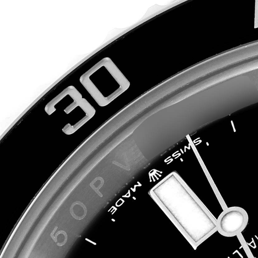 This image shows a close-up view of the bezel, dial, and partially visible hand of a Rolex Submariner 126610LN Men
s Stainless Steel Black Dial 126610LN Men
s Stainless Steel Black Dial watch.