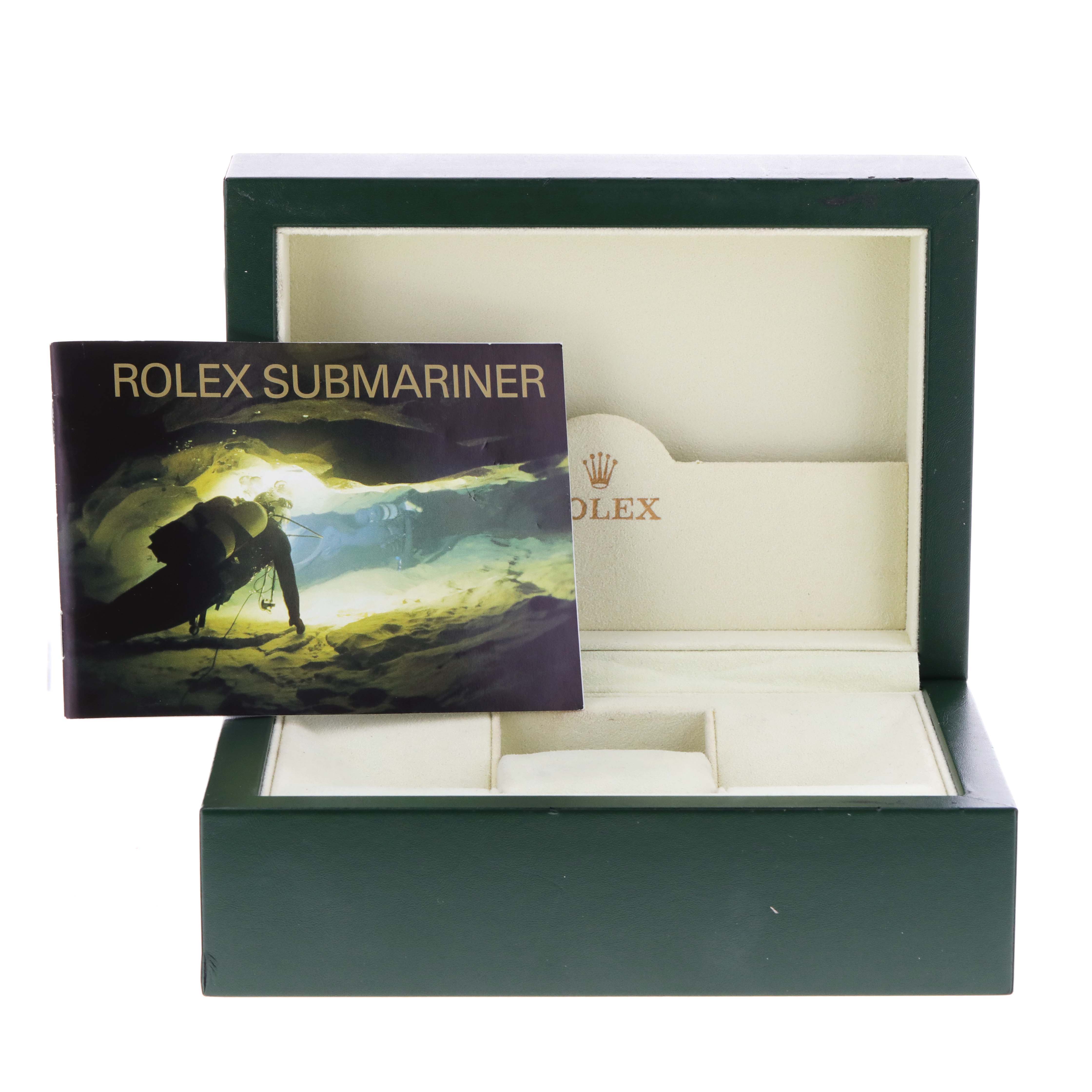 The image shows the box and manual for a Rolex Submariner 16610 Men
s Stainless Steel Black Dial 16610 Men
s Stainless Steel Black Dial watch with an open, empty interior.