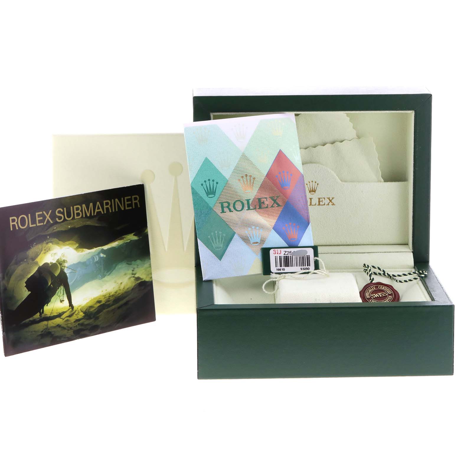 The image shows the accessories and packaging for a Rolex Submariner 16610 Men
s Stainless Steel Black Dial 16610 Men
s Stainless Steel Black Dial, including the box, booklet, and tags.