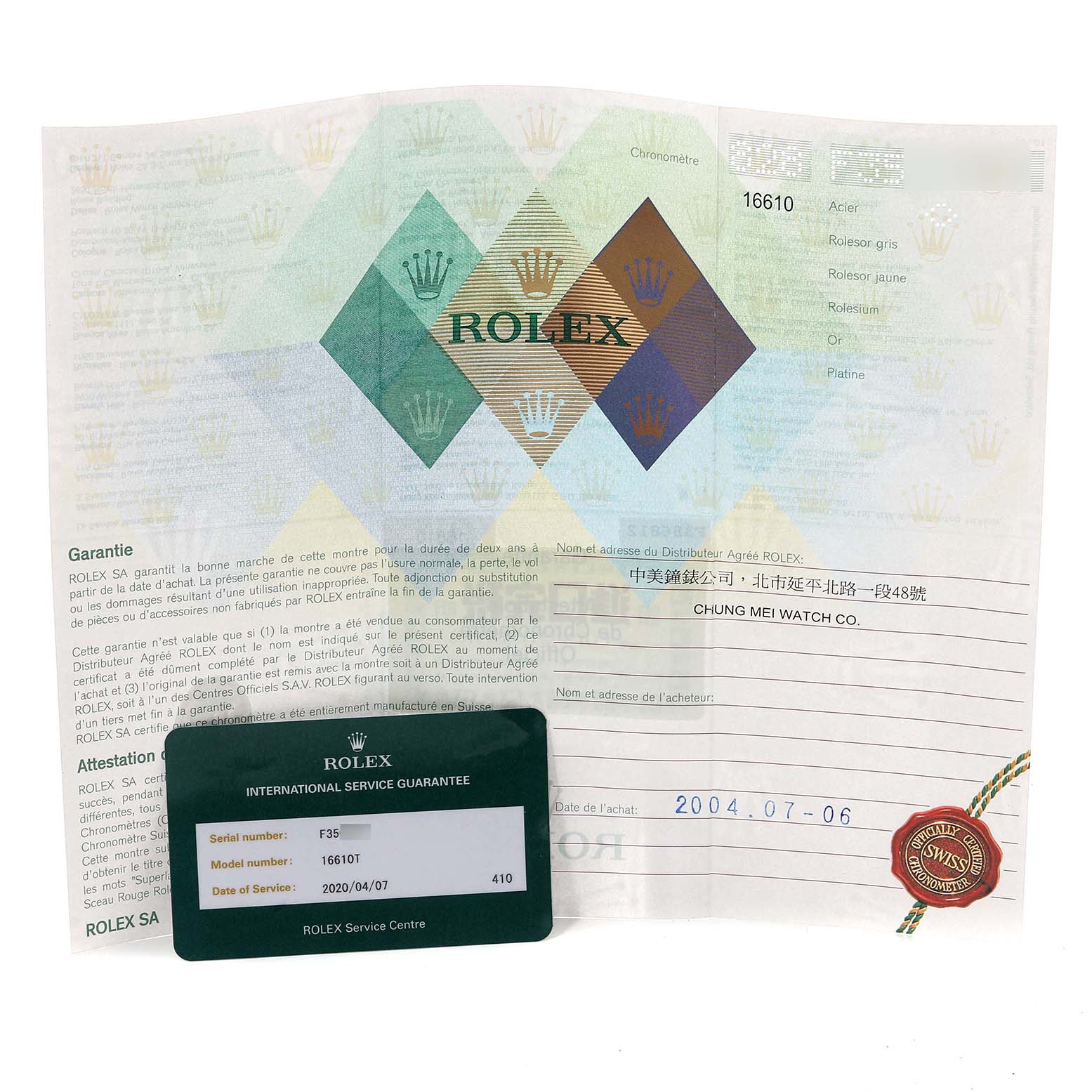 The image shows the warranty paperwork and international service guarantee card for the Rolex Submariner 16610 Men
s Stainless Steel Black Dial 16610 Men
s Stainless Steel Black Dial model.