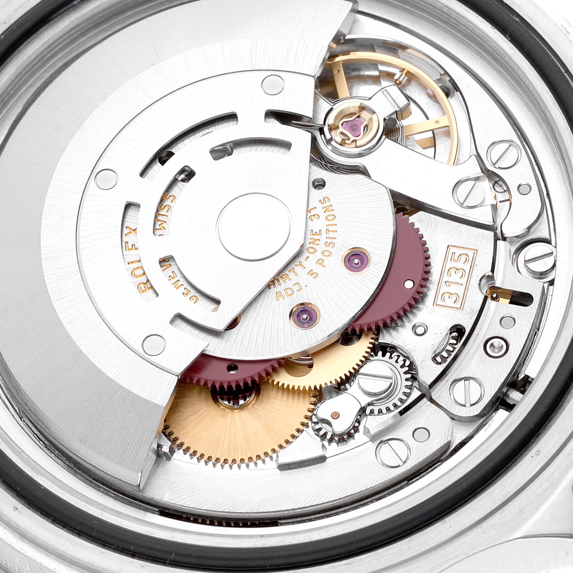 This image shows a close-up view of the Rolex Submariner 16610 Men's Stainless Steel Black Dial 16610 Men's Stainless Steel Black Dial's movement components.
