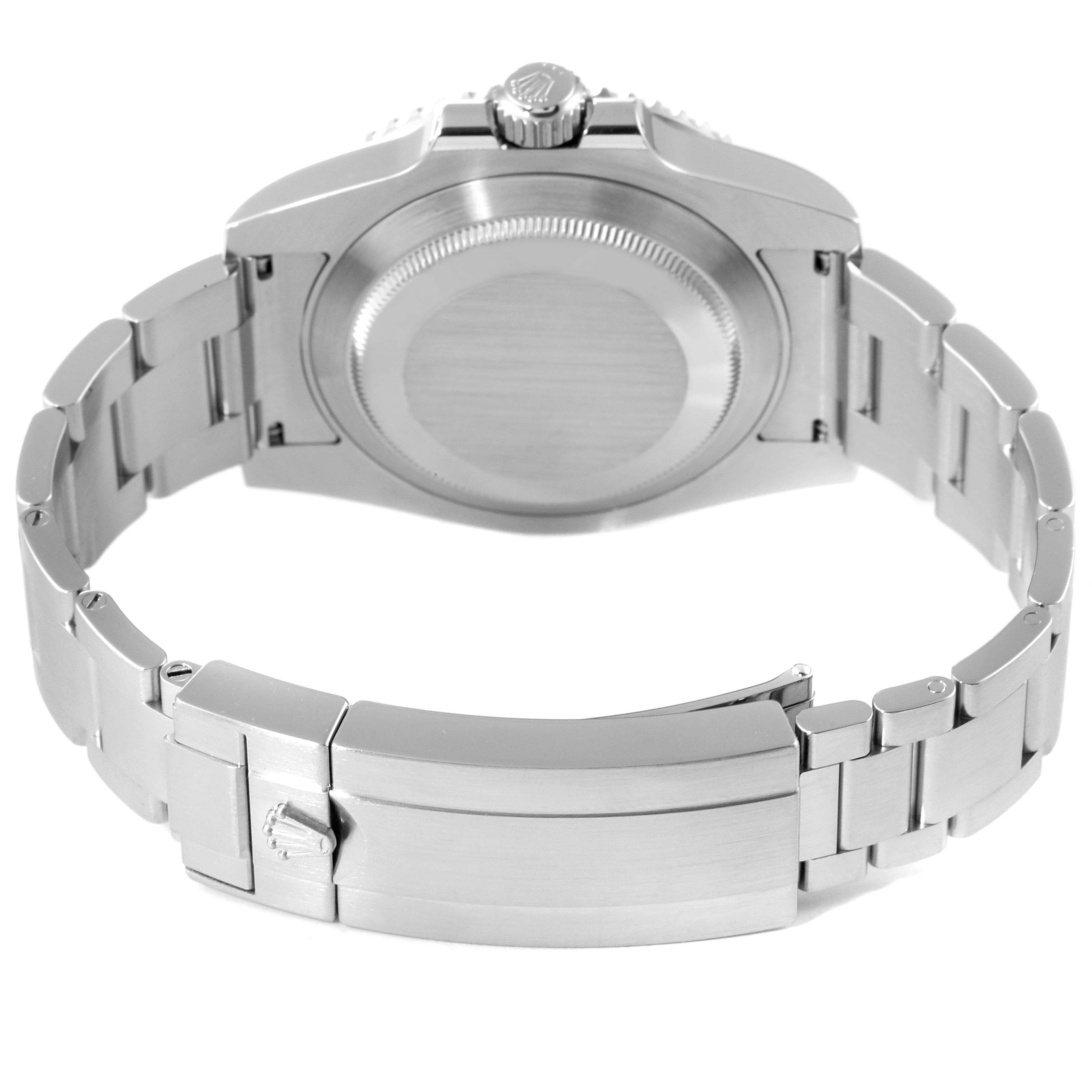 The image shows the back view of a Rolex Submariner 116610LV Men
s Stainless Steel Green Dial 116610LV Men
s Stainless Steel Green Dial watch, highlighting the bracelet, clasp, and case back.