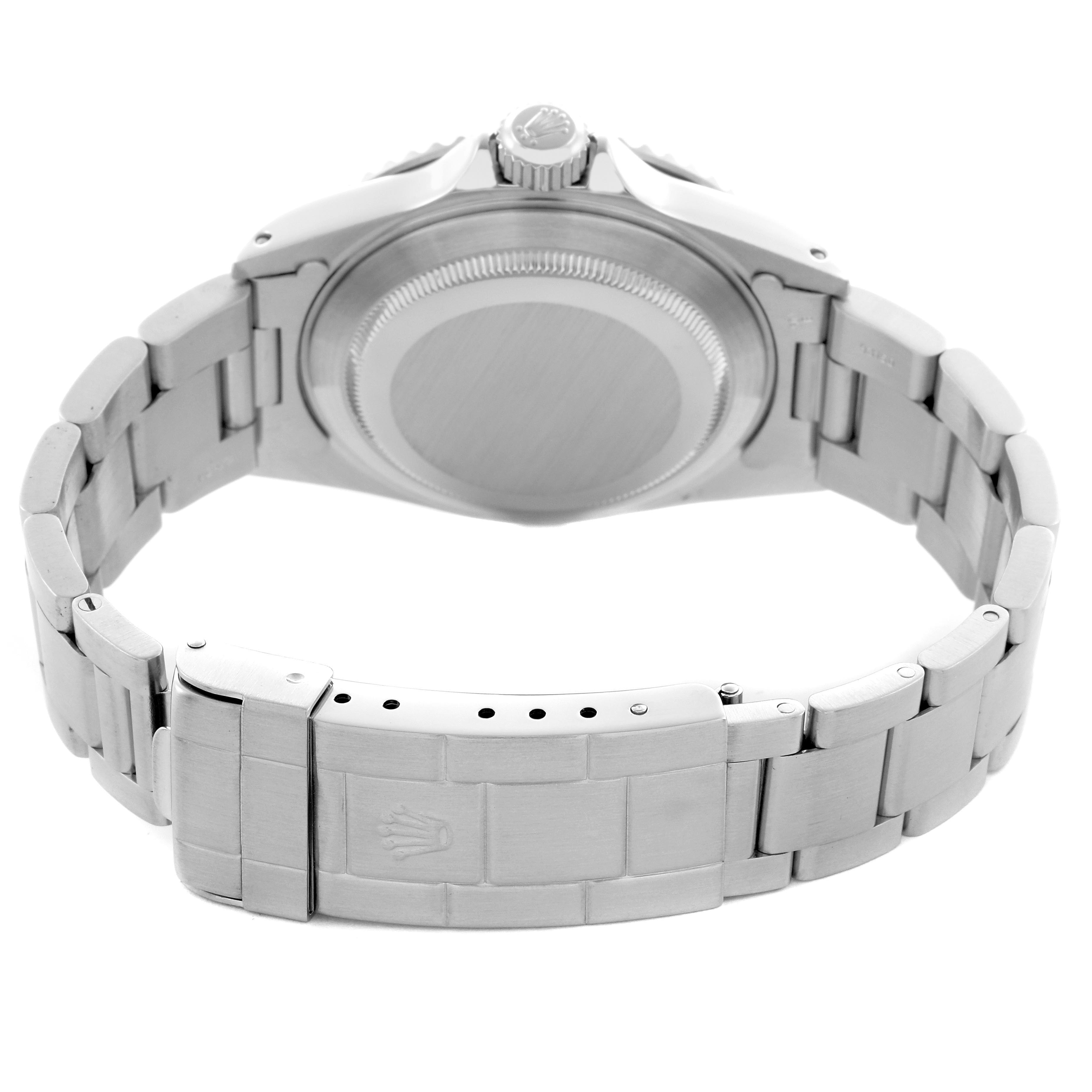 The image shows the back and bracelet clasp of a Rolex Submariner 14060 Men
s Stainless Steel Black Dial 14060 Men
s Stainless Steel Black Dial watch at an angled rear view.