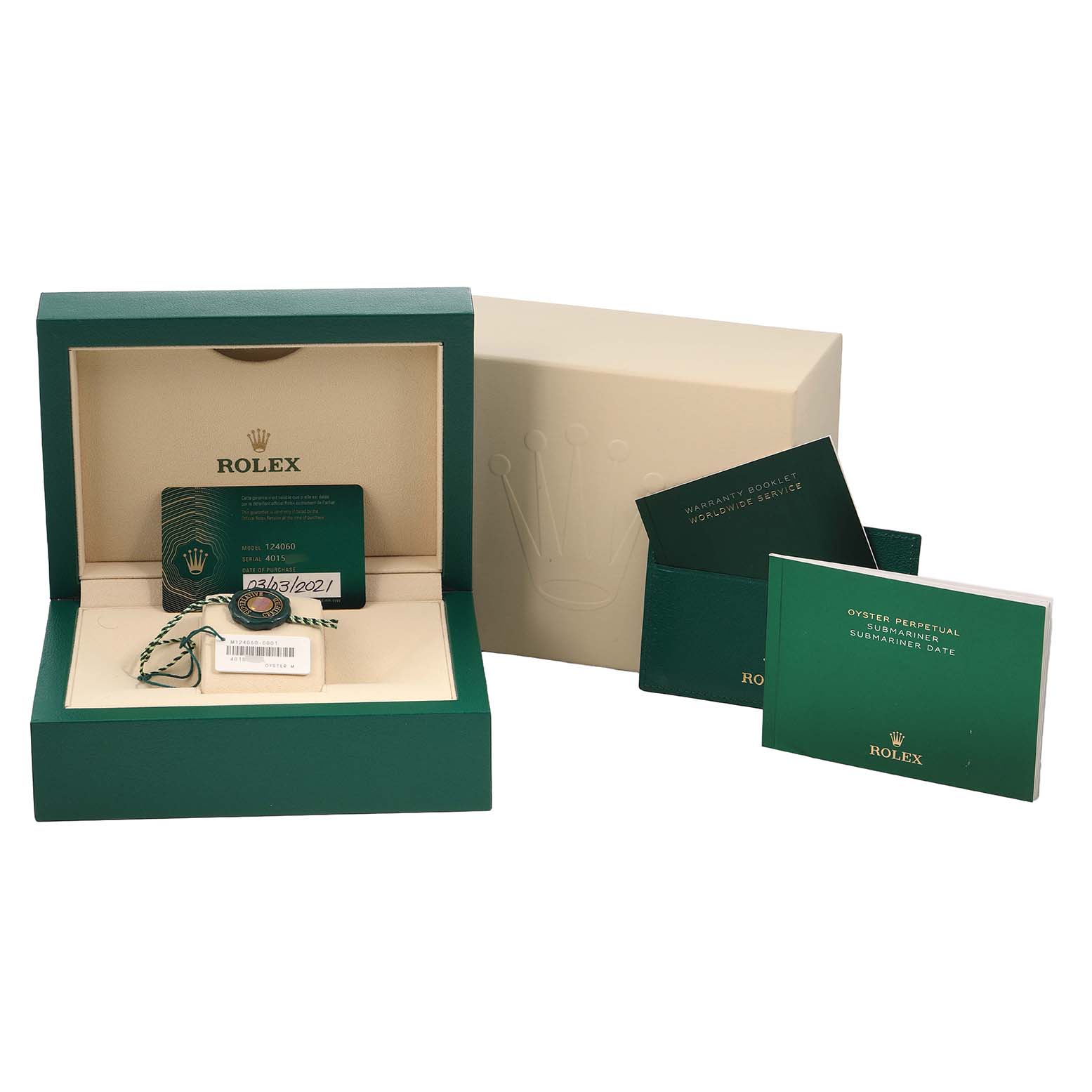 The image shows the Rolex Submariner 124060 Men's Stainless Steel Black Dial's box, warranty card, tag, and booklets from a front angle.