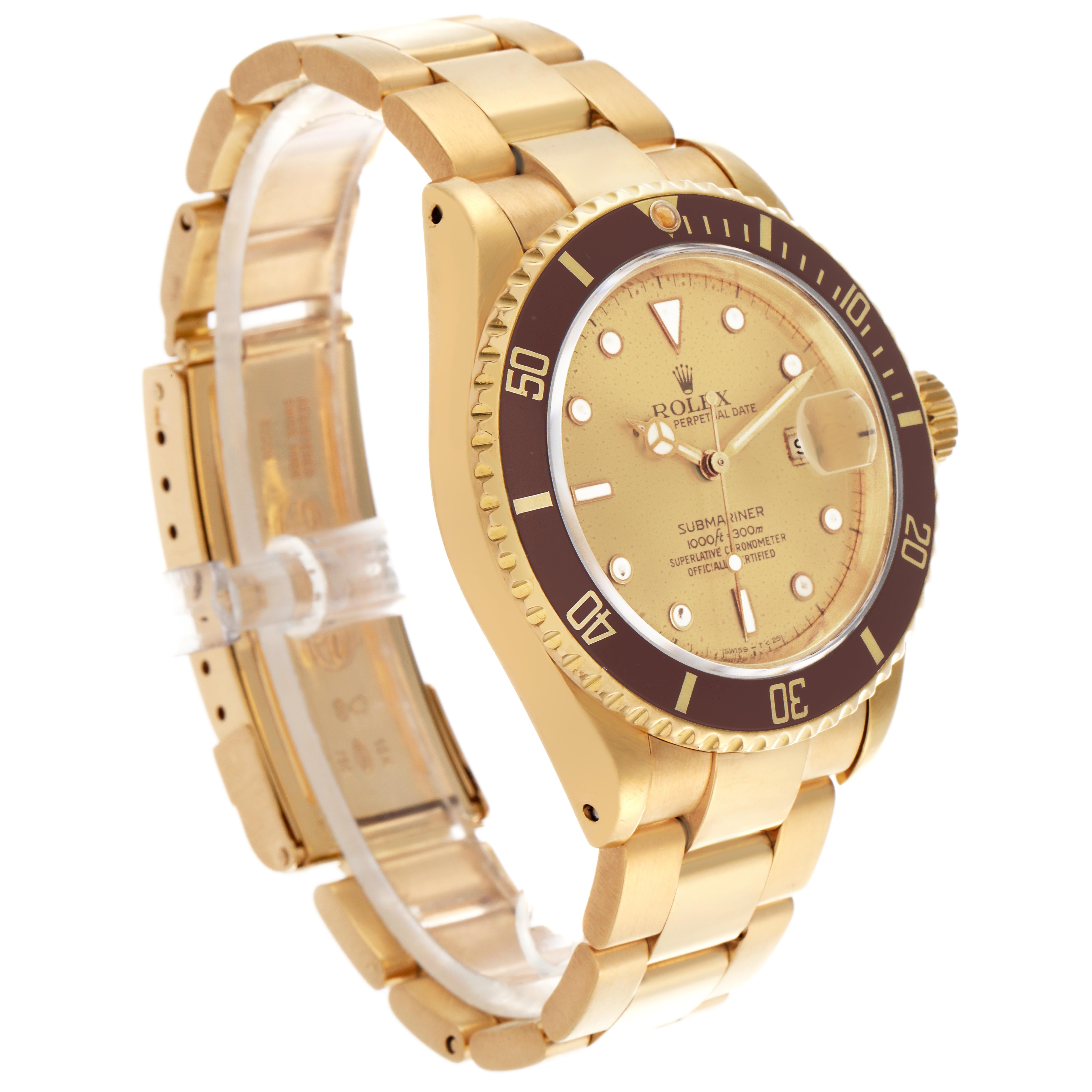 The Rolex Submariner 16618 Men's Yellow Gold Champagne Dial 16618 Men's Yellow Gold Champagne Dial watch is shown at an angled side view, highlighting the gold bracelet, bezel, and dial.