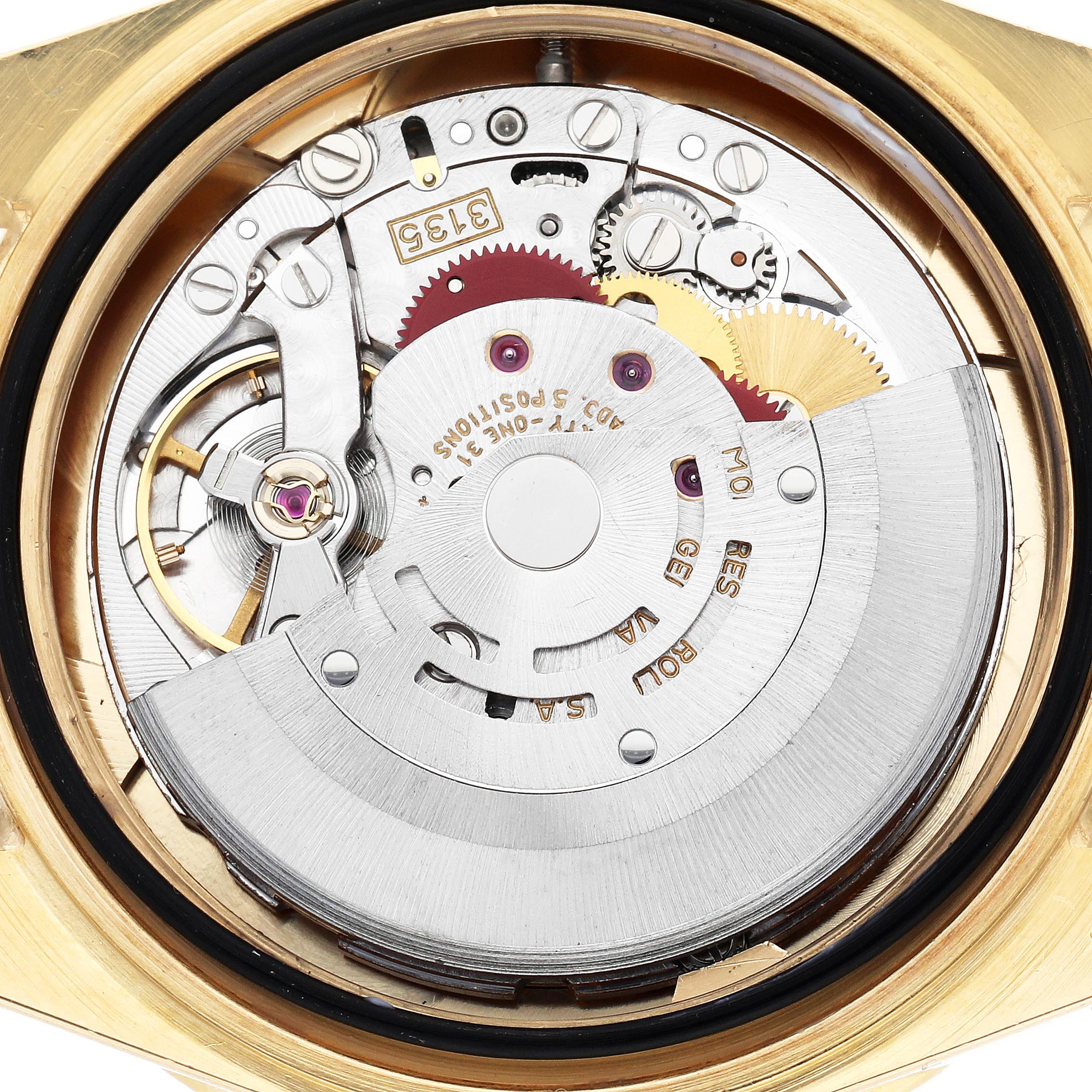 The image shows the Rolex Submariner 16618 Men's Yellow Gold Champagne Dial 16618 Men's Yellow Gold Champagne Dial's movement from the back, highlighting the rotor and internal mechanical components.