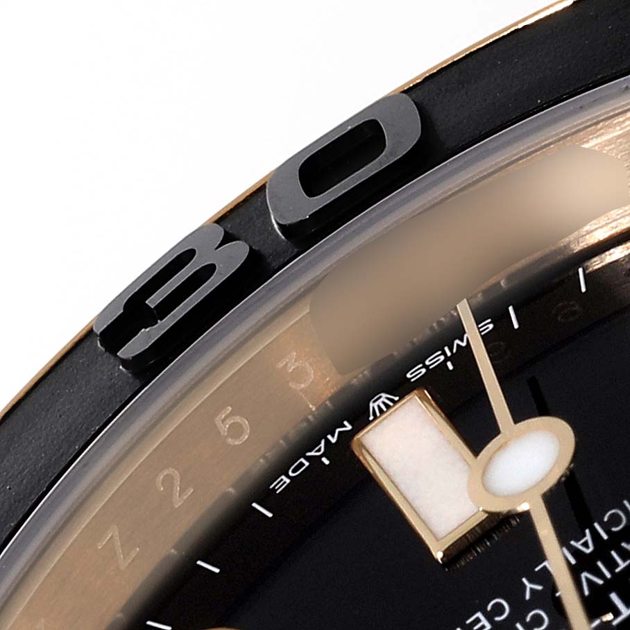 The image shows a close-up of the bezel and part of the dial of a Rolex Yacht-Master 226658 Men's Yellow Gold Black Dial 226658 Men's Yellow Gold Black Dial watch.
