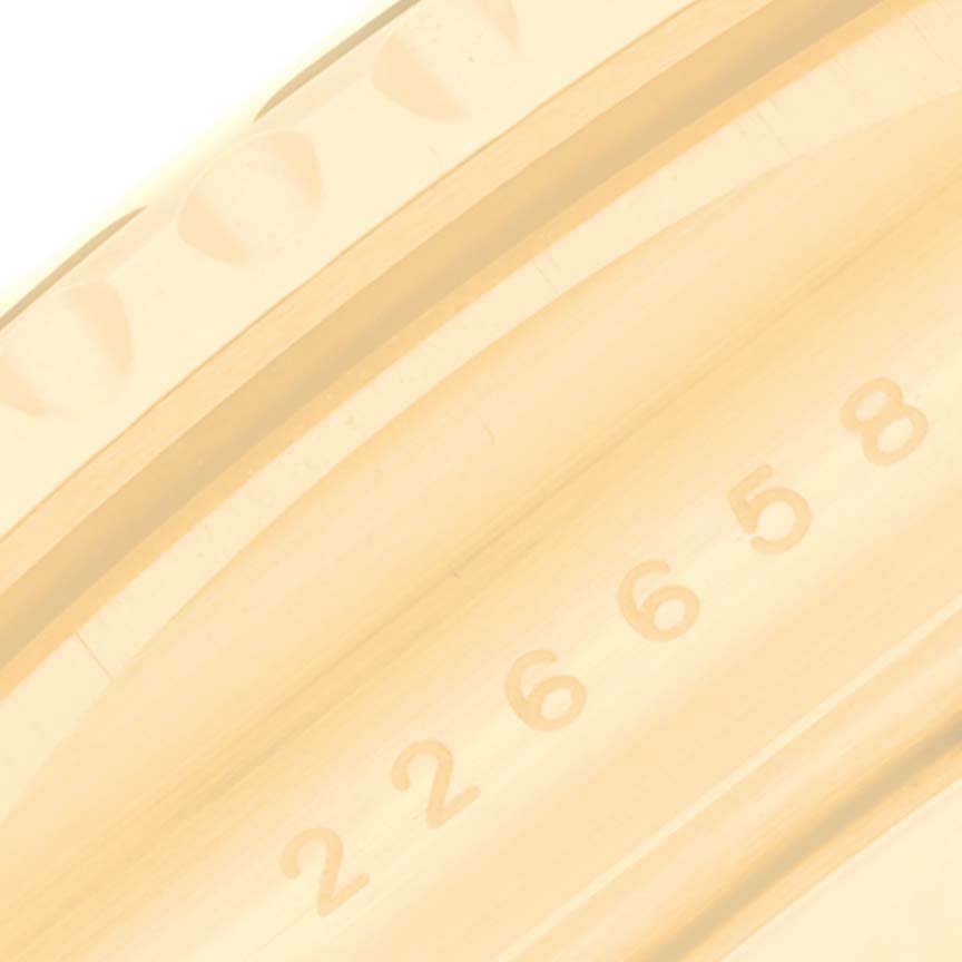 The image shows a close-up of the serial number located on the side of the Rolex Yacht-Master 226658 Men's Yellow Gold Black Dial 226658 Men's Yellow Gold Black Dial watch case.