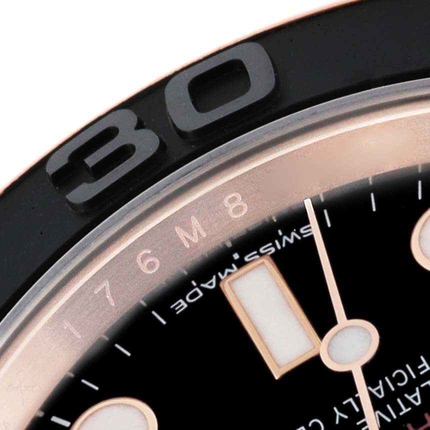 This image shows a close-up of the bezel and dial of a Rolex Yacht-Master 116655 Men's Rose Gold Black Dial 116655 Men's Rose Gold Black Dial watch, specifically highlighting the 30-minute marker.