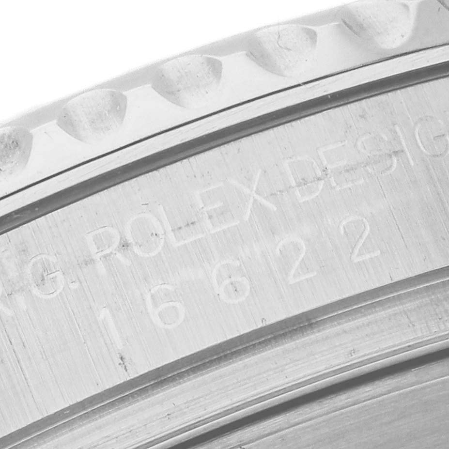 The image shows a close-up of the bezel and engraved details on a Rolex Yacht-Master 16622 Men
s Stainless Steel Silver Dial 16622 Men
s Stainless Steel Silver Dial watch.
