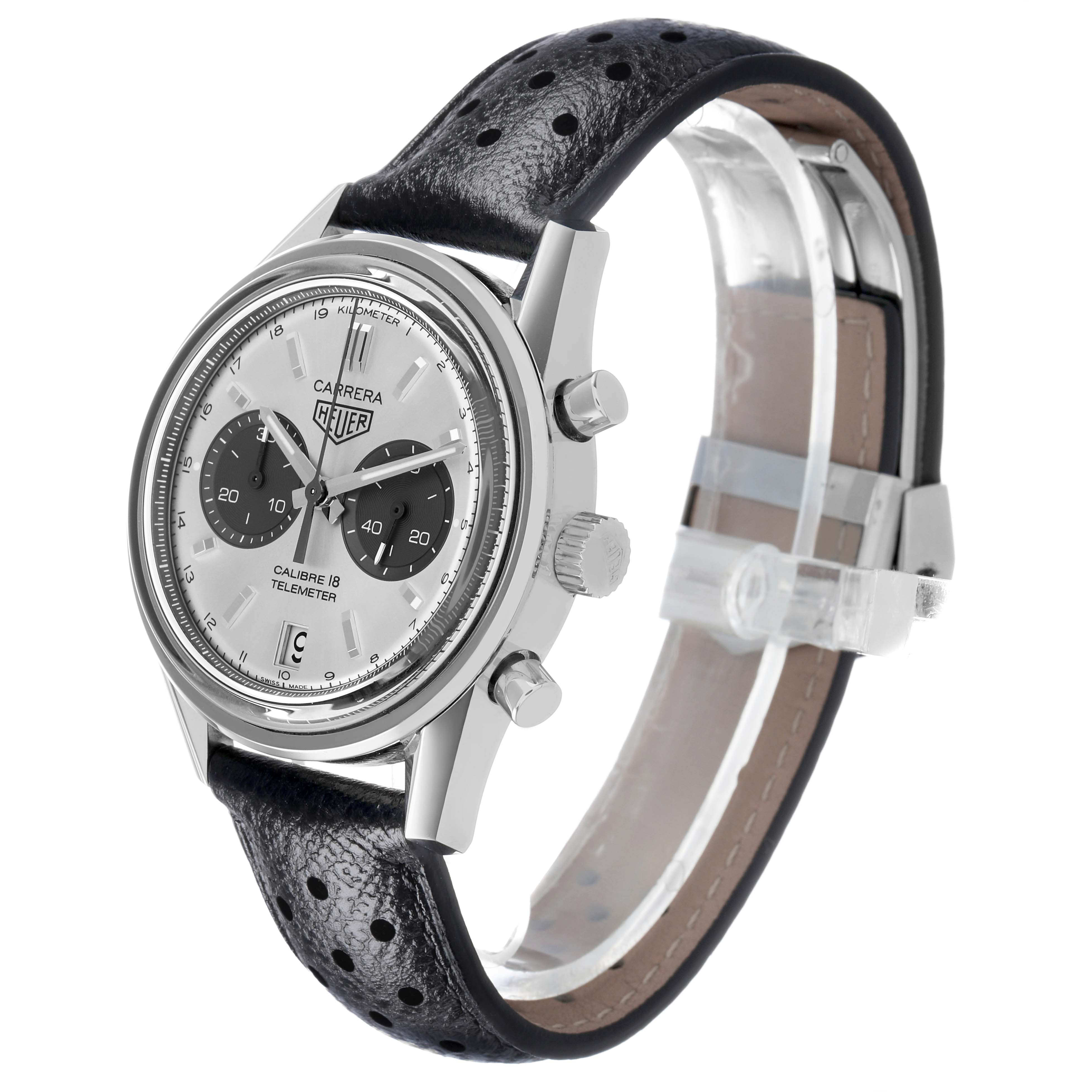 The Tag Heuer Carrera CAR221A Men's Stainless Steel Silver Dial watch is shown at a three-quarter angle, highlighting the face, side buttons, and perforated leather strap.