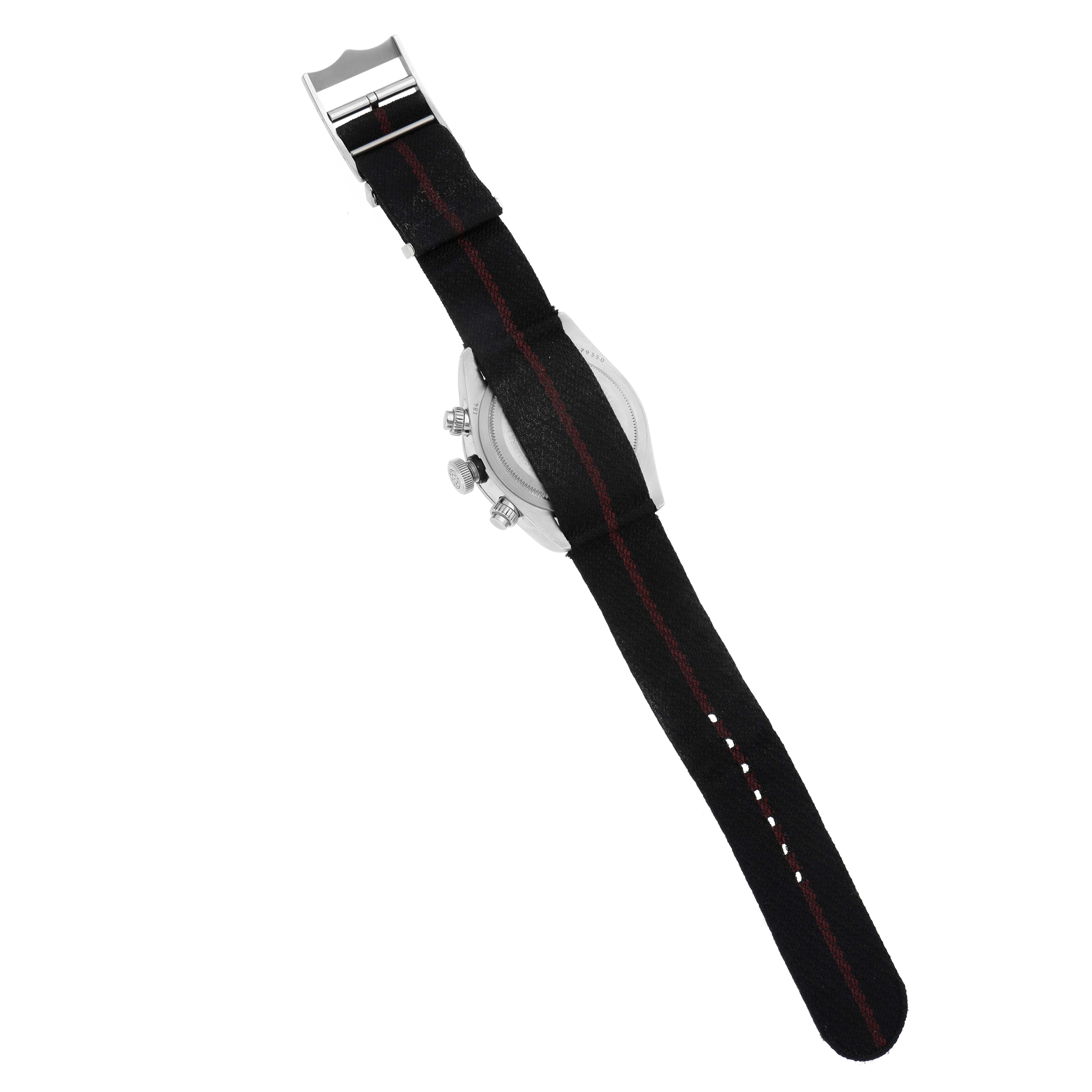 The Tudor Heritage Black Bay 79350 Men
s Stainless Steel Black Dial 79350 Men
s Stainless Steel Black Dial watch is shown from the back, displaying the open strap and side view of the case and crown.