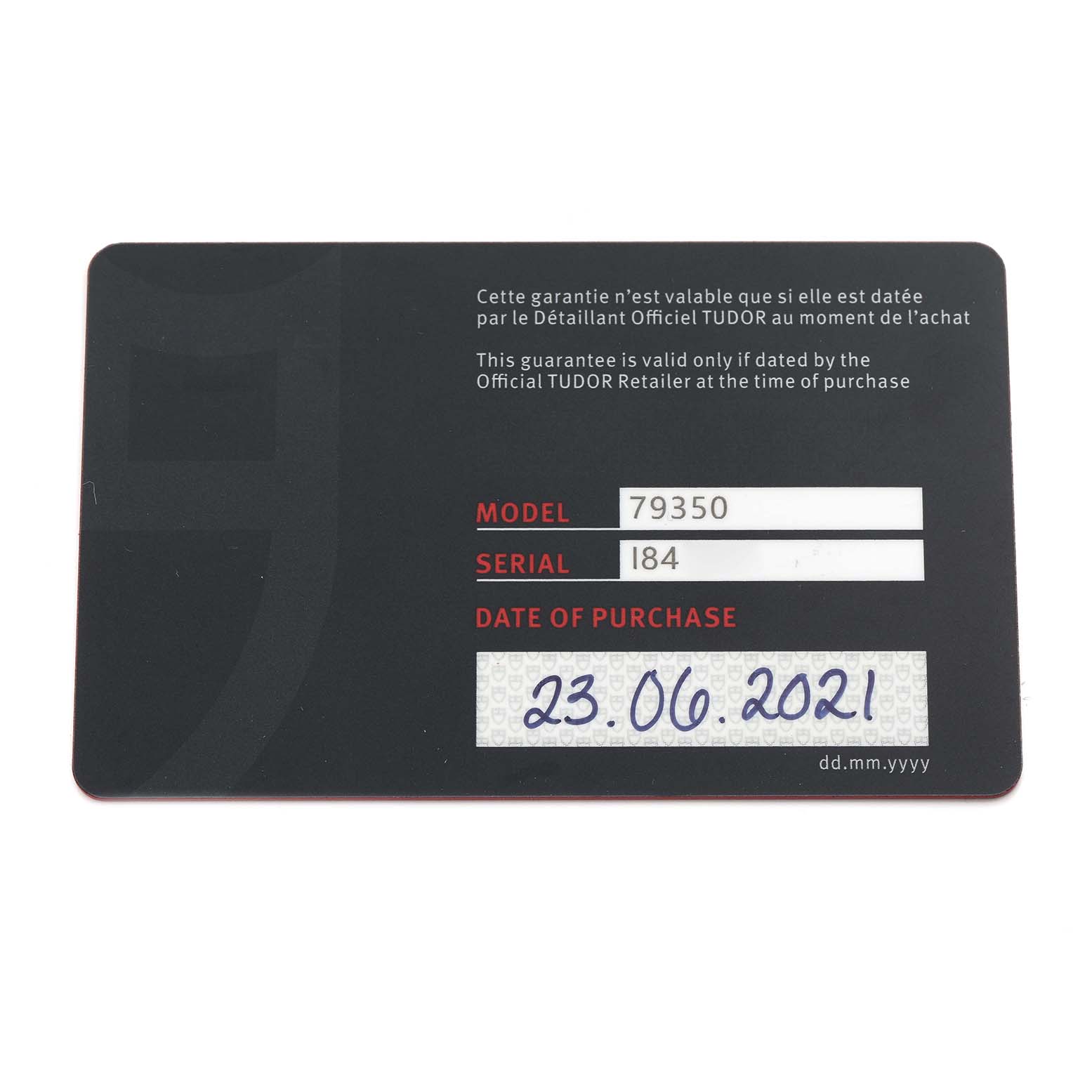 The image shows a warranty card for the Tudor Heritage Black Bay 79350 Men
s Stainless Steel Black Dial 79350 Men
s Stainless Steel Black Dial 79350, displaying model, serial, and purchase date.