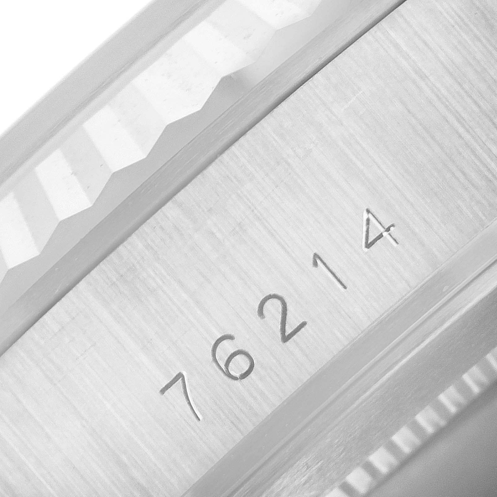 The image shows a close-up of the bezel and the engraved case number of the Tudor Prince 76214 Men's Stainless Steel White Dial 76214 Men's Stainless Steel White Dial model watch.