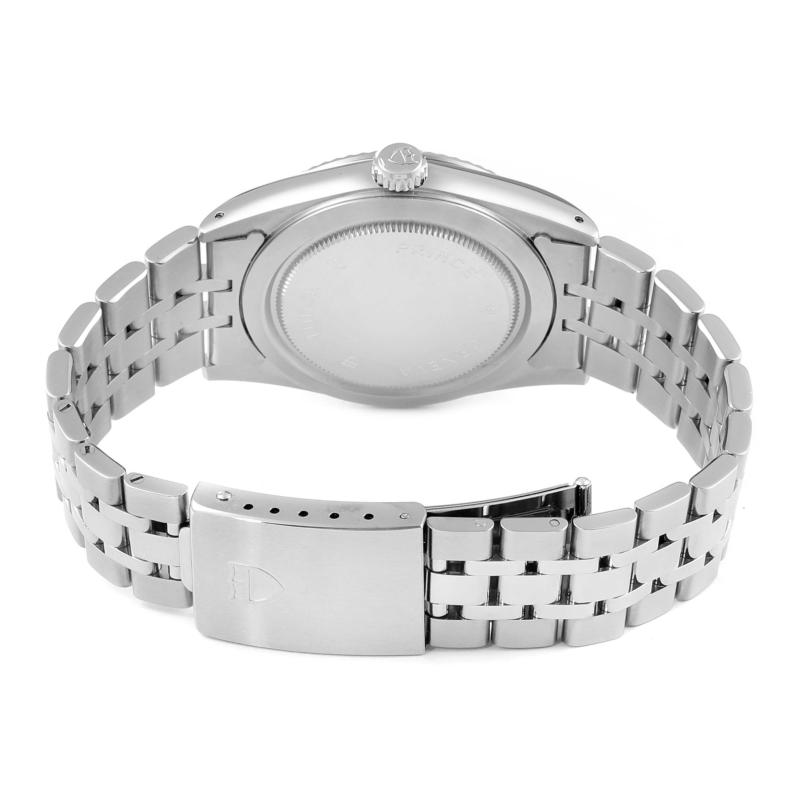 The image shows the back view of the Tudor Prince 76214 Men's Stainless Steel White Dial 76214 Men's Stainless Steel White Dial model, highlighting its closed case back, crown, and metal link bracelet with clasp.