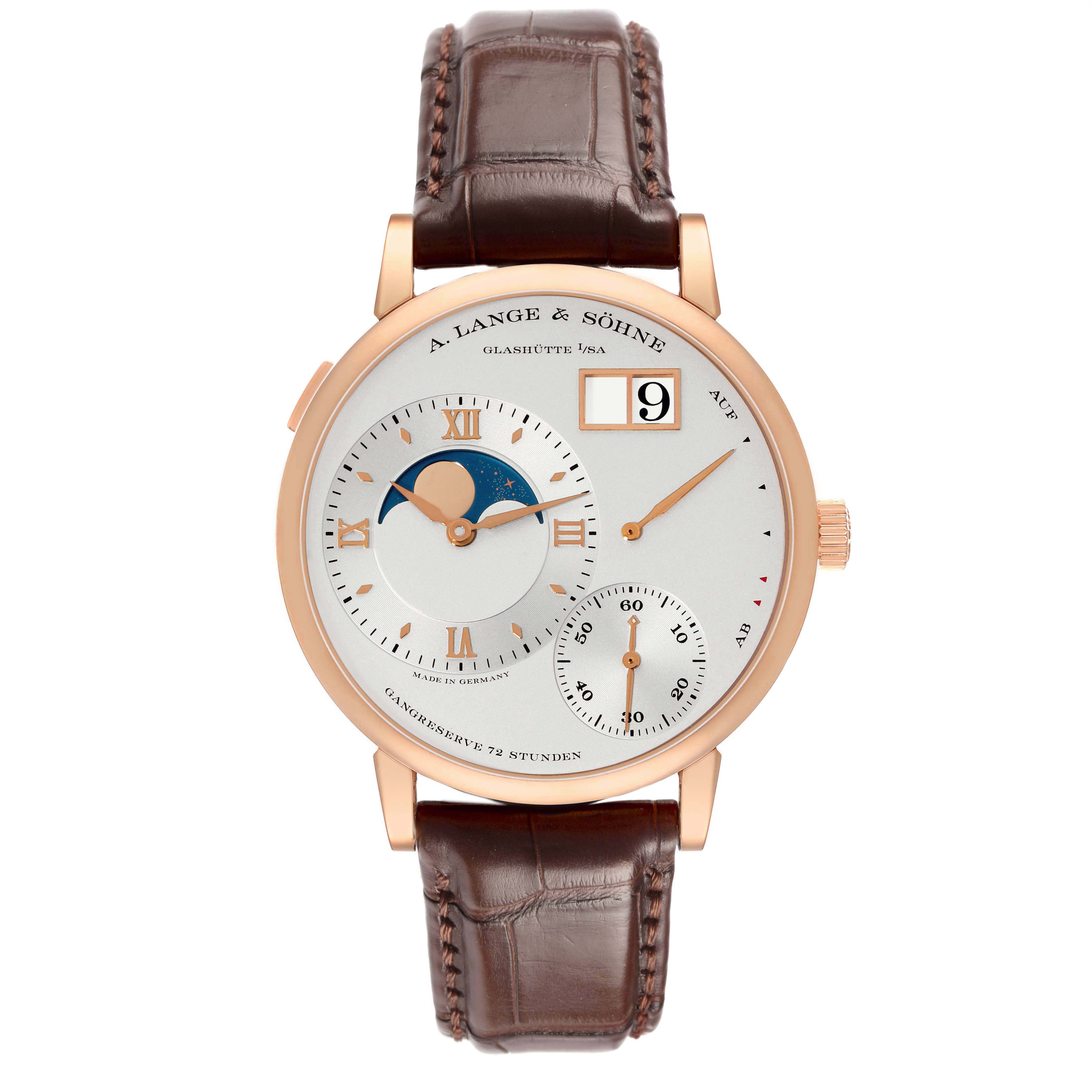 The A. Lange & Sohne Lange 1 139.032 Men's Rose Gold Silver Dial watch is shown from the front, displaying its dial, moon phase, and brown leather strap.