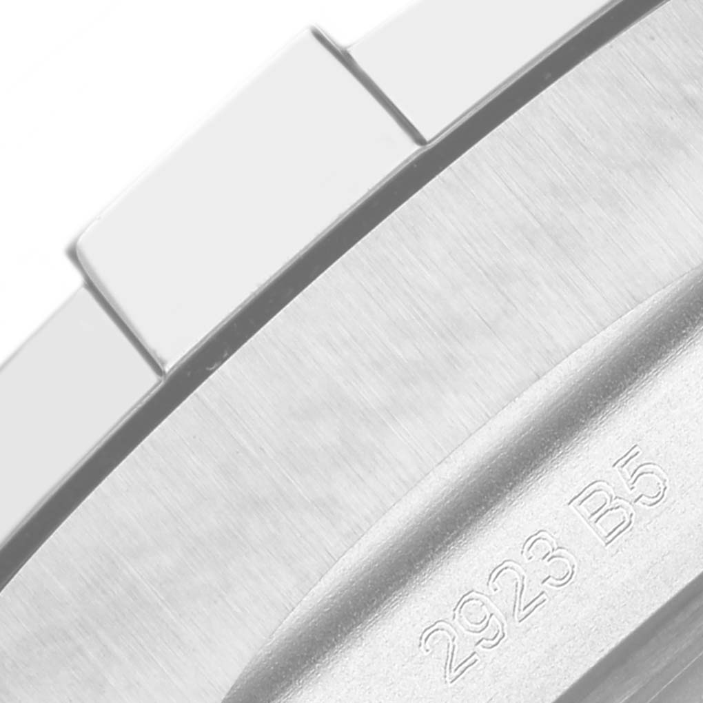 This close-up image shows a portion of the bezel and case, with serial engraving of the Breitling Avenger A24315 Men's Stainless Steel Blue Dial A24315 Men's Stainless Steel Blue Dial watch.