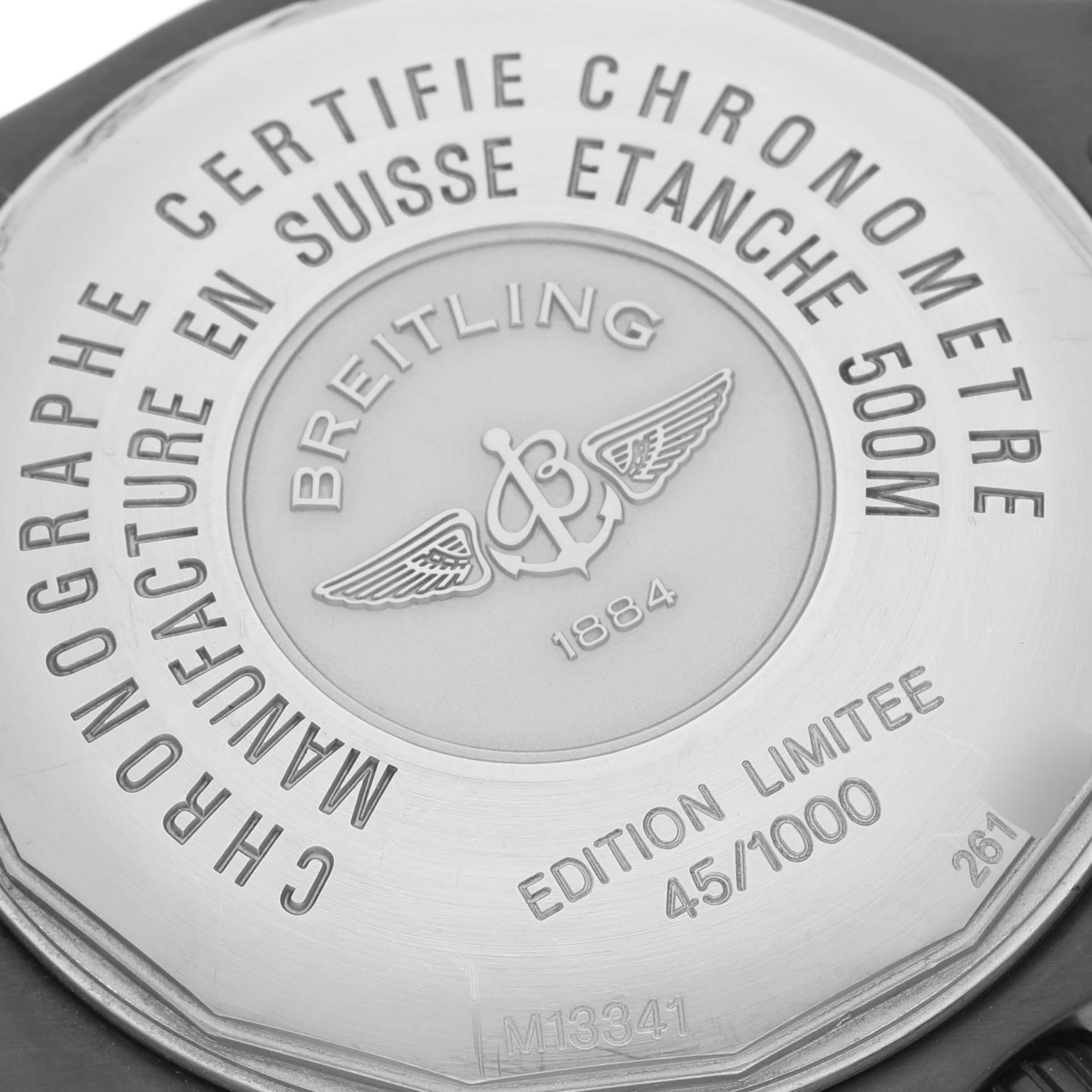 The image shows the back of a Breitling Limited Series watch, highlighting the engraved details and brand logo.