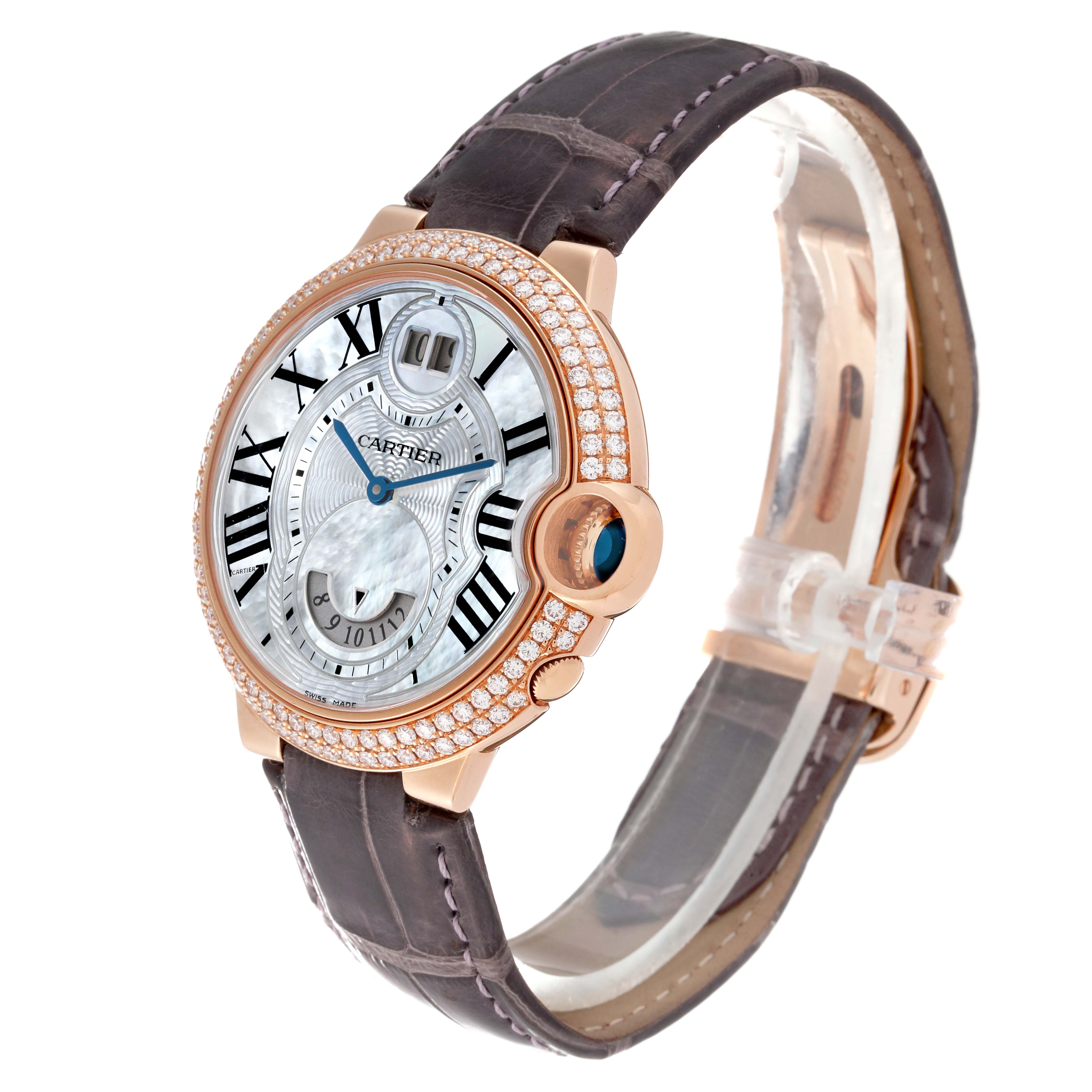 The image shows a Cartier Ballon Bleu WE902018 Women's Rose Gold Mother of Pearl Dial WE902018 Women's Rose Gold Mother of Pearl Dial watch angled to display the watch face, crown, and leather strap.