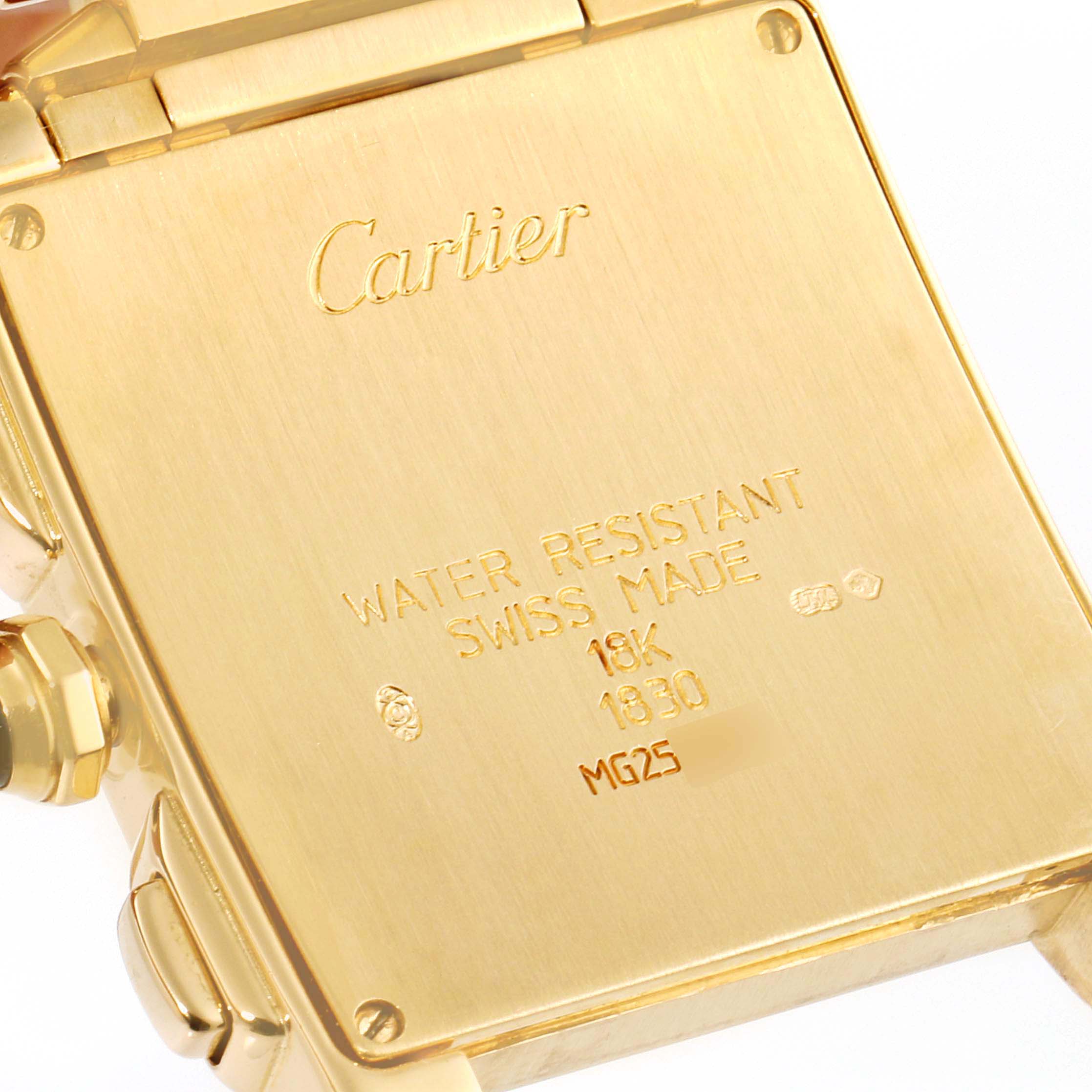 The image shows the gold back case of a Cartier Tank Francaise W50005R2 Men's Yellow Gold Silver Dial W50005R2 Men's Yellow Gold Silver Dial watch, displaying engravings and screws.