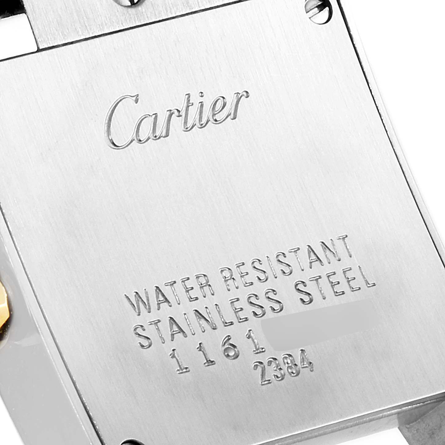 This image shows the back case of a Cartier Tank Française watch, highlighting its water resistance and stainless-steel material.
