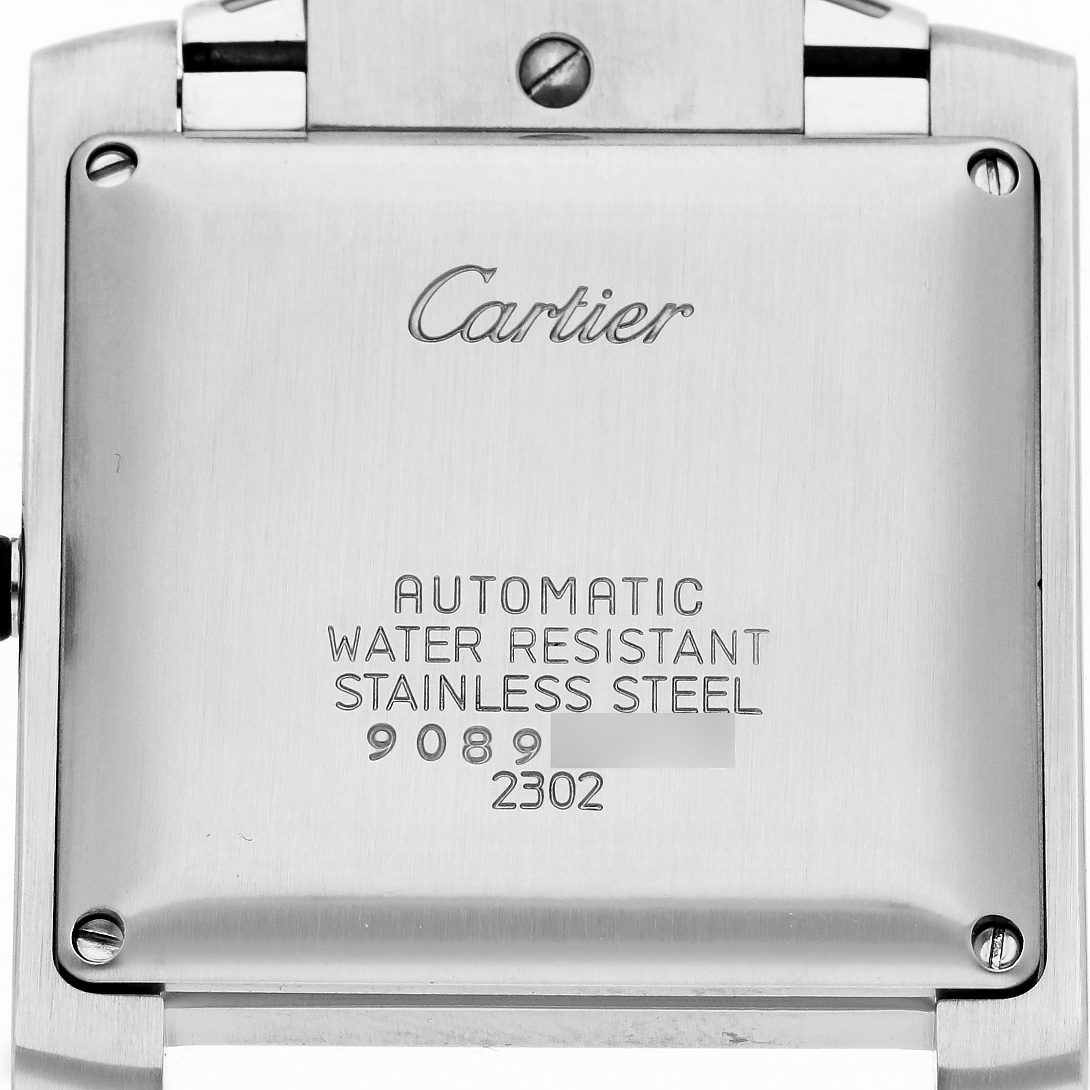 The image shows the back case of a Cartier Tank Française watch, highlighting the branding and specifications.