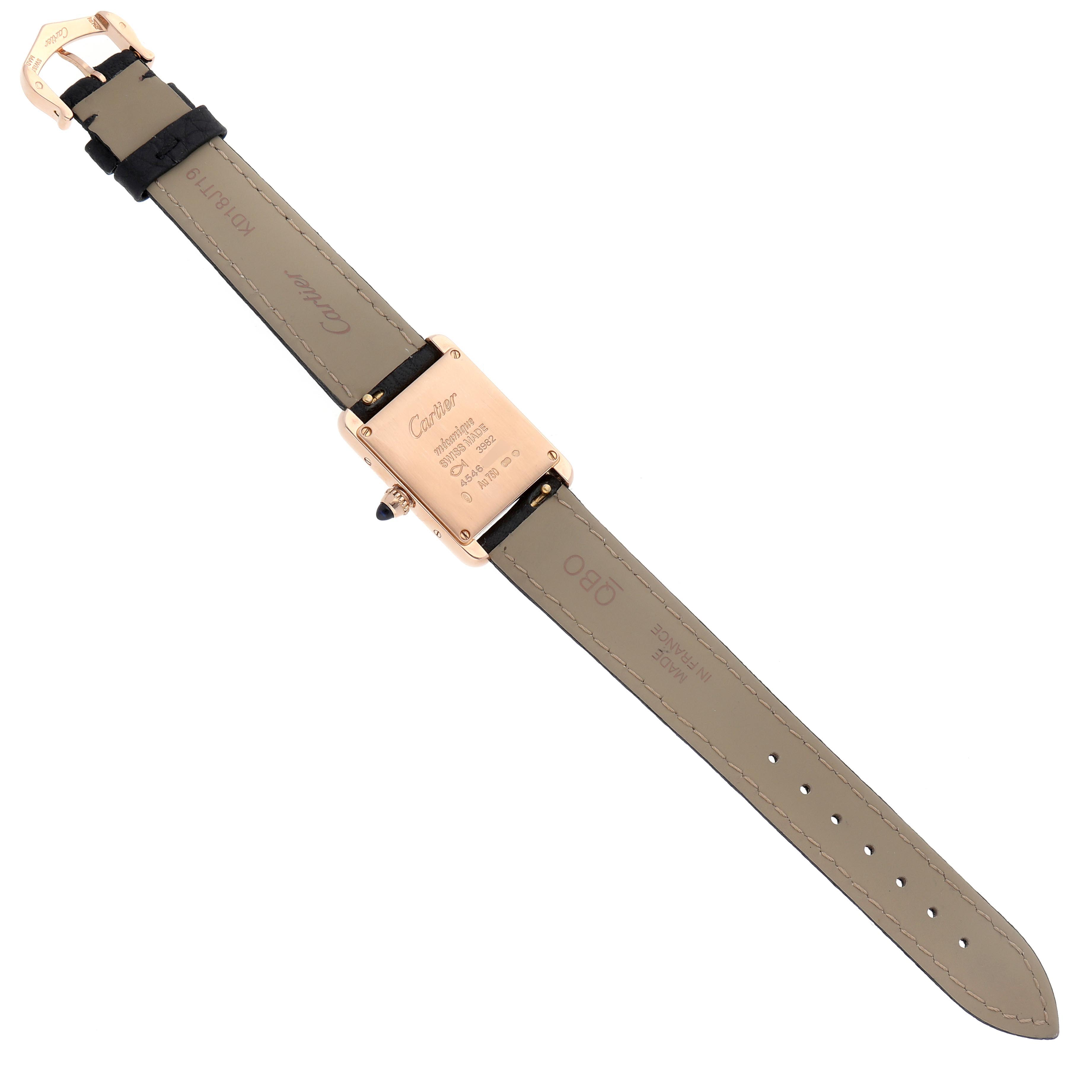 The image shows the back of a Cartier Tank Louis WGTA0010 Women
s Rose Gold Silver Dial WGTA0010 Women
s Rose Gold Silver Dial watch, highlighting its strap and clasp from a top-down angle.