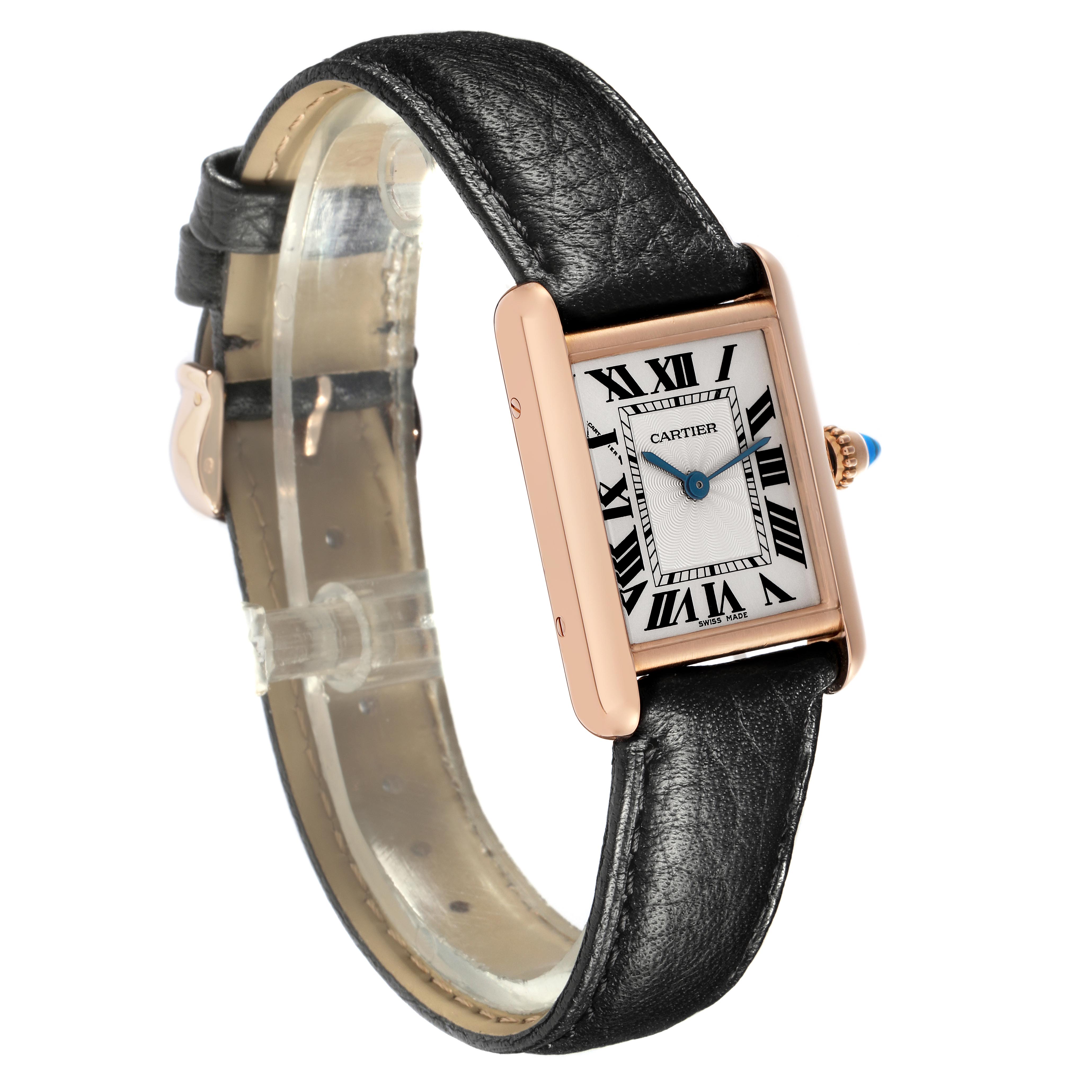 The Cartier Tank Louis WGTA0010 Women
s Rose Gold Silver Dial WGTA0010 Women
s Rose Gold Silver Dial watch is shown at a three-quarter angle, highlighting its rectangular case, Roman numeral dial, and leather strap.