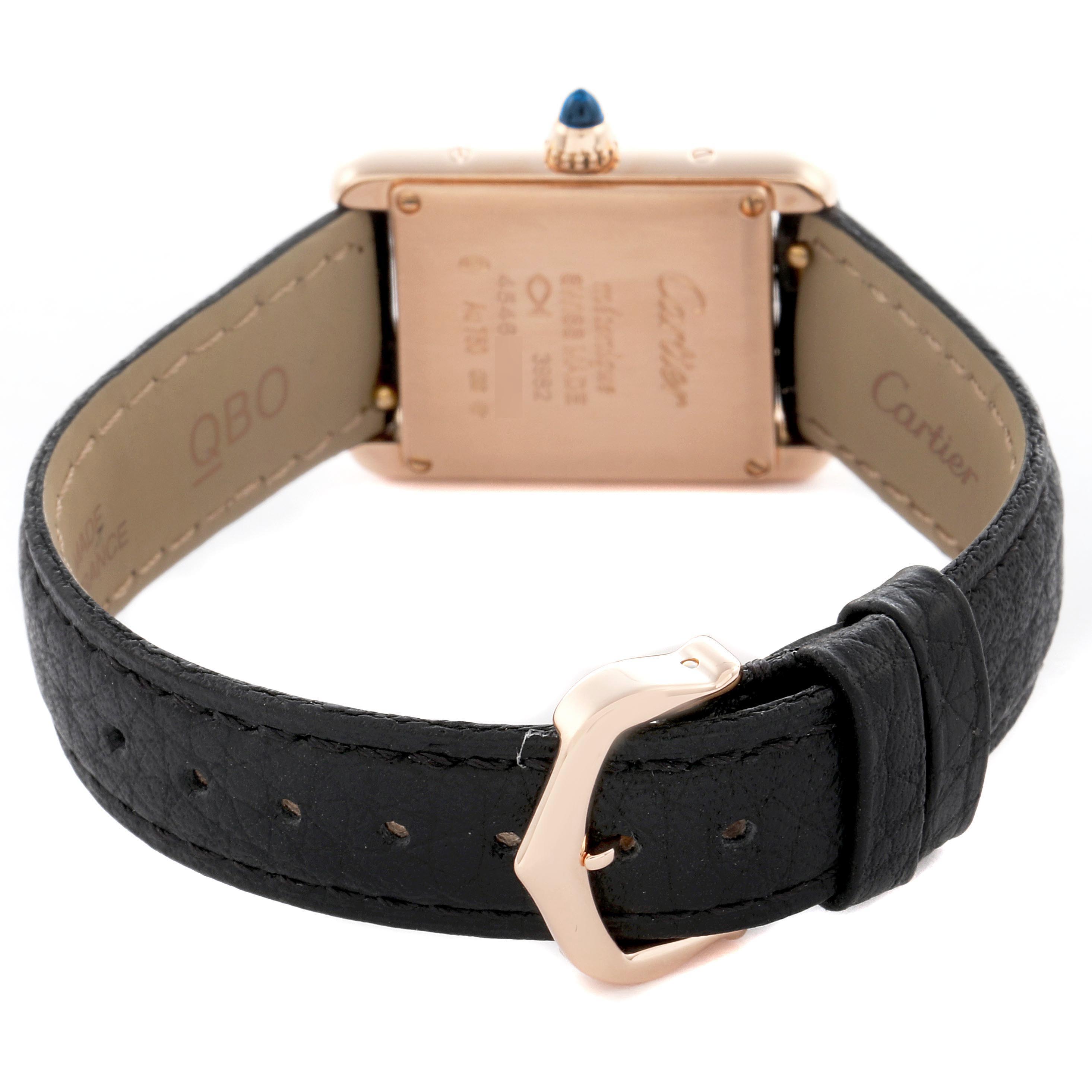 The image shows the Cartier Tank Louis WGTA0010 Women
s Rose Gold Silver Dial WGTA0010 Women
s Rose Gold Silver Dial watch from the back, highlighting the case, leather strap, and buckle.