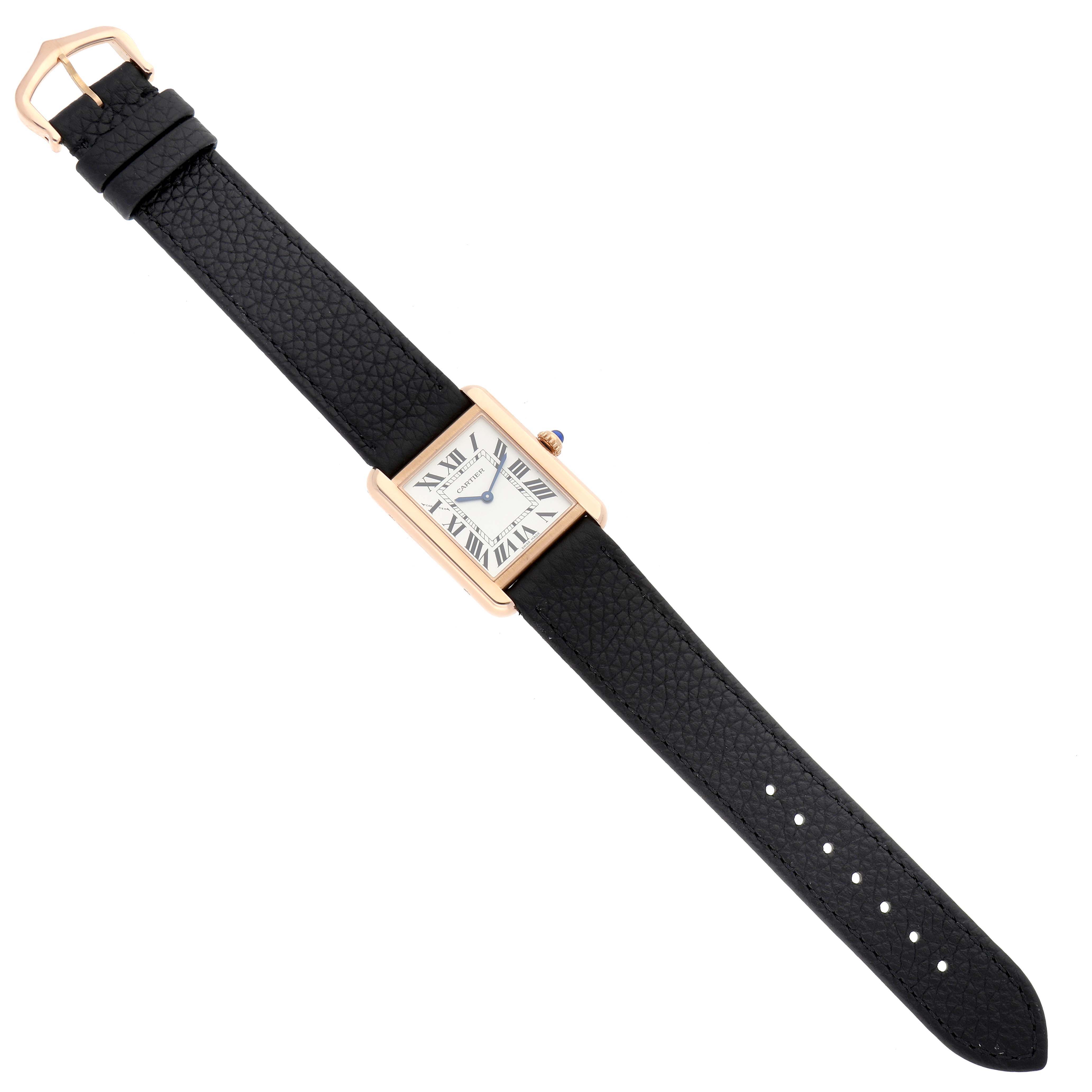 The image shows a top-down view of a Cartier Tank Solo W5200024 Women's Steel and Gold (two tone) Silver Dial W5200024 Women's Steel and Gold (two tone) Silver Dial watch with a black leather strap and a rectangular gold case.