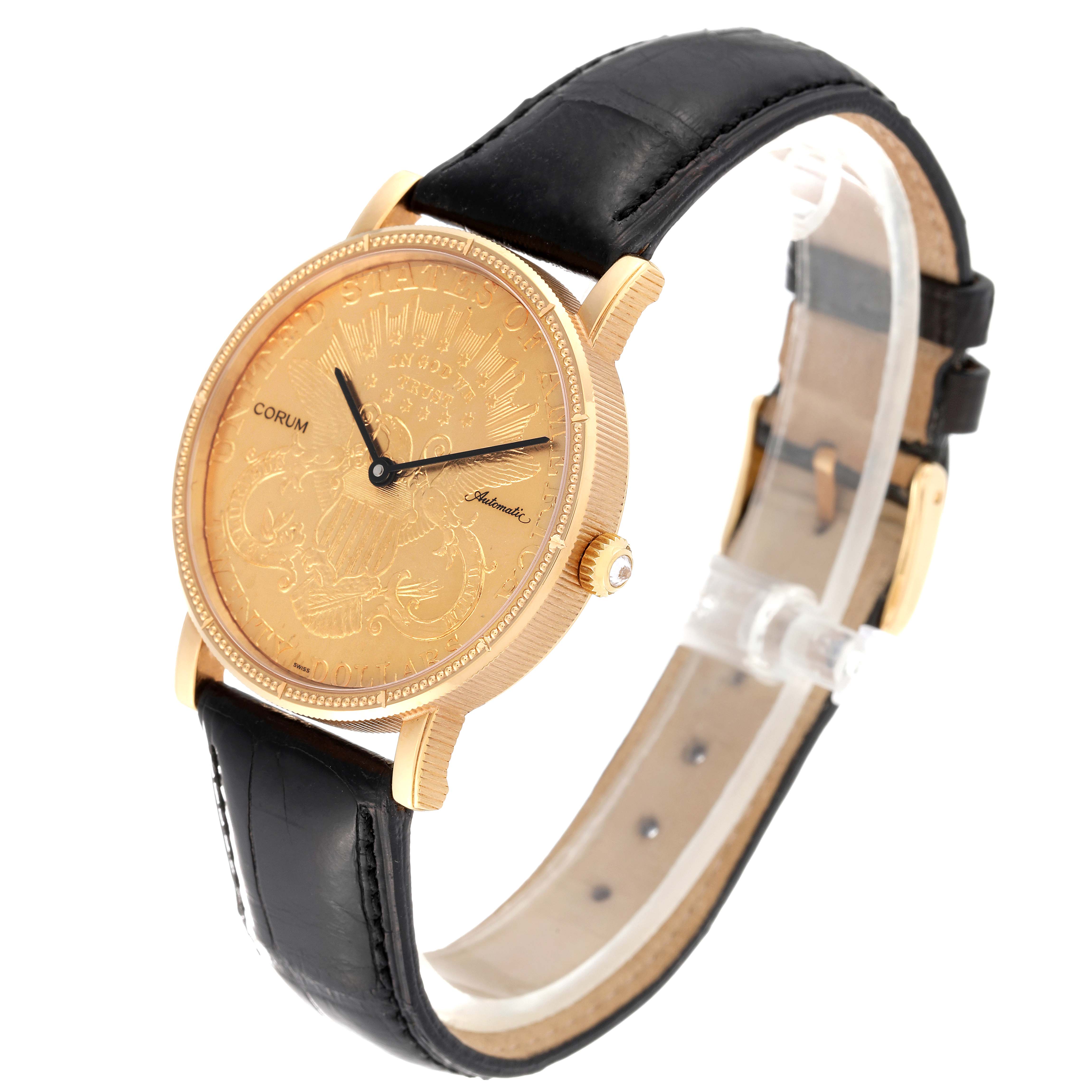 The Corum Coin Watch Men's Yellow Gold Champagne Dial Men's Yellow Gold Champagne Dial model is shown from a three-quarter angle, showcasing the gold case, black leather strap, and detailed watch face.