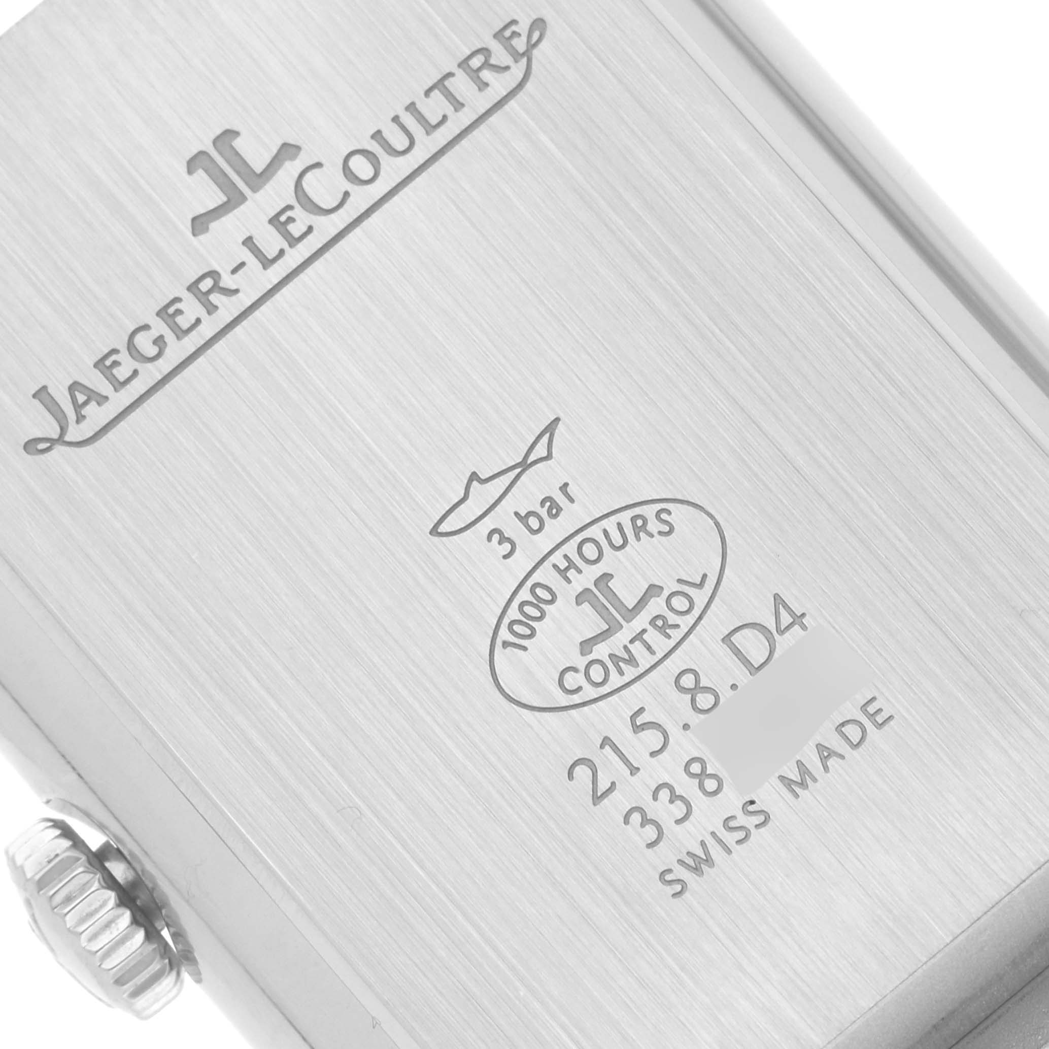 This image shows the back case of a Jaeger-LeCoultre Reverso watch, highlighting the brand logo, model number, and specifications.