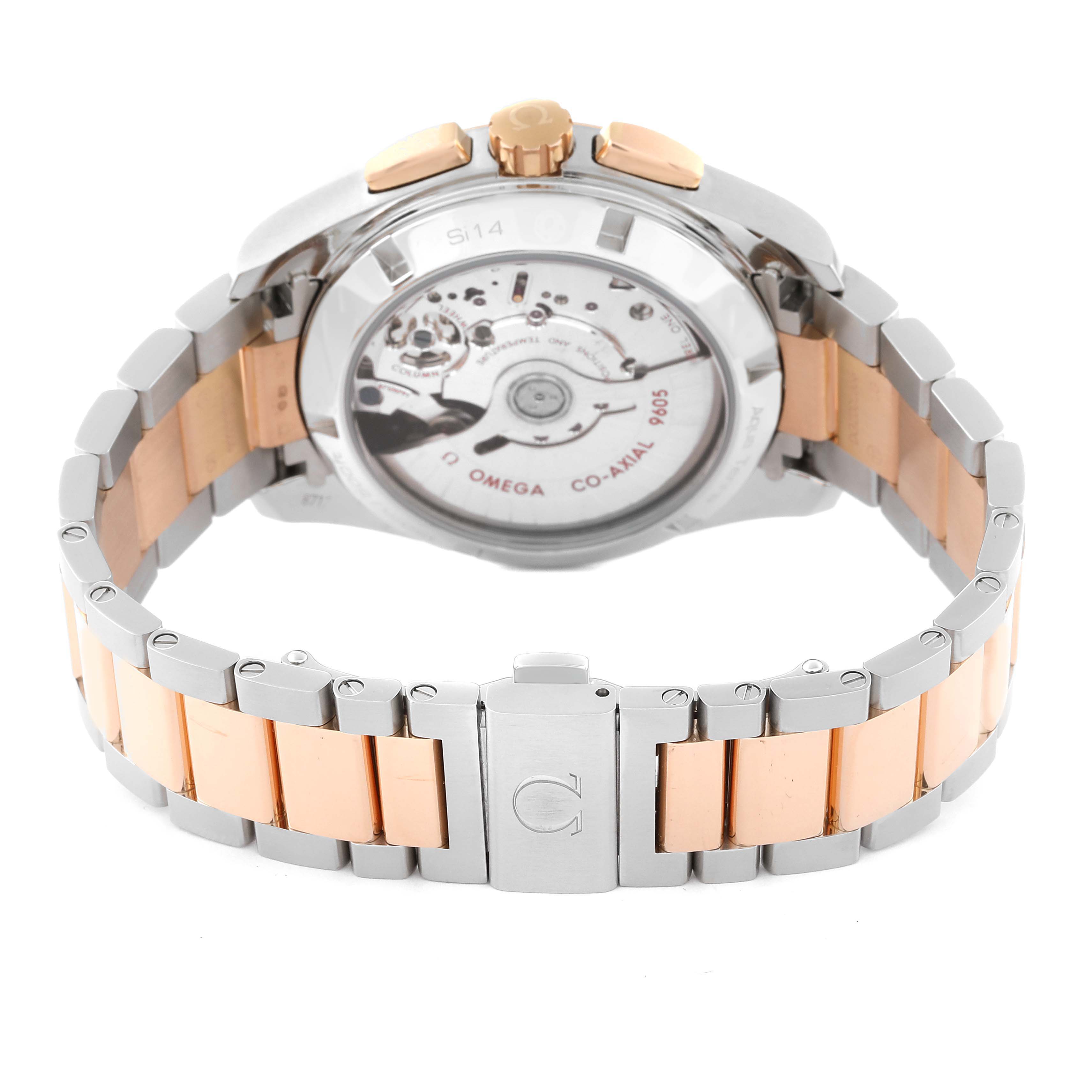 The image shows the back view of the Omega Aqua Terra 231.20.43.52.06.001 Men's Steel and Gold (two tone) Grey Dial 231.20.43.52.06.001 Men's Steel and Gold (two tone) Grey Dial watch, highlighting its movement and two-tone bracelet.