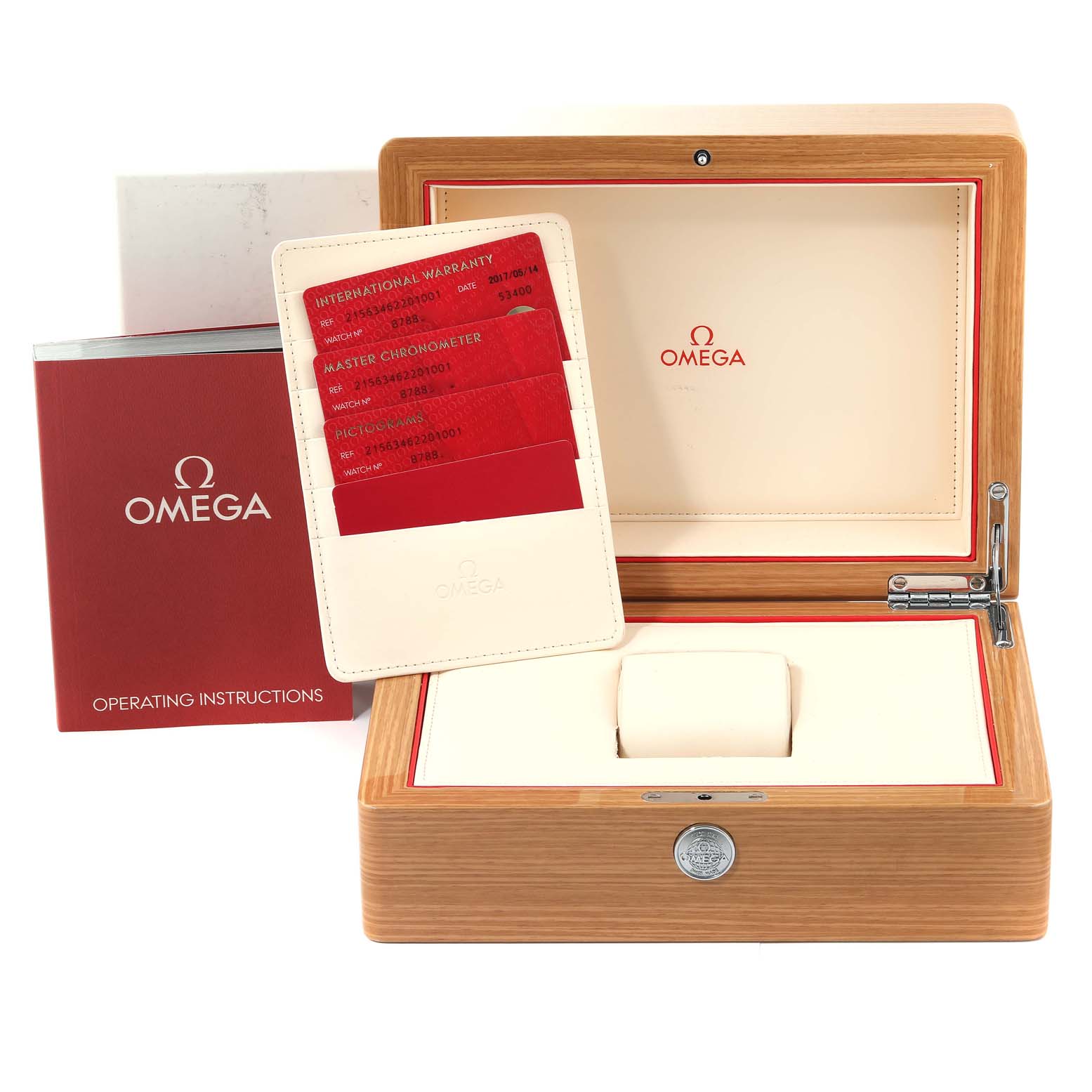 The image shows the open box, warranty card holder, and operating instructions of an Omega Planet Ocean 215.63.46.22.01.001 Men's Ceramic Black Dial 215.63.46.22.01.001 Men's Ceramic Black Dial watch.