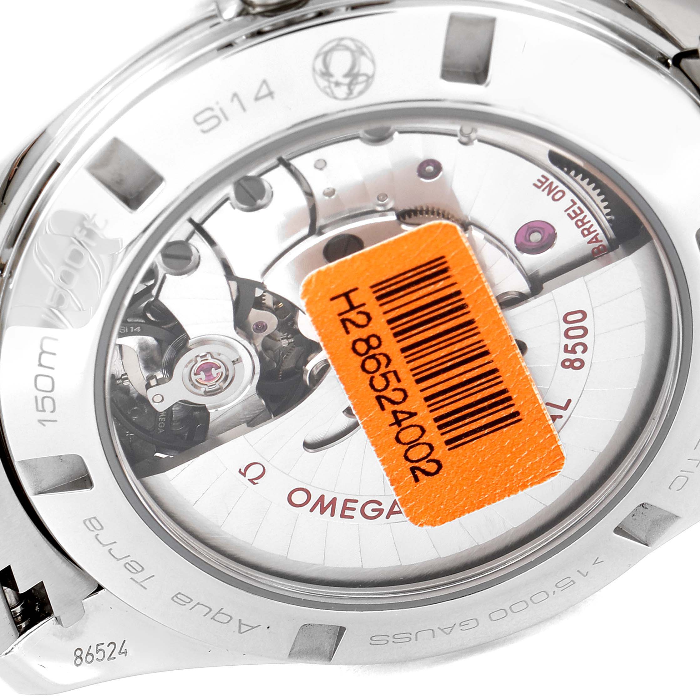 The image shows the back of an Omega Aqua Terra 231.10.42.21.03.006 Men
s Stainless Steel Blue Dial 231.10.42.21.03.006 Men
s Stainless Steel Blue Dial watch, highlighting its inner mechanics with an orange barcode sticker on the display caseback.