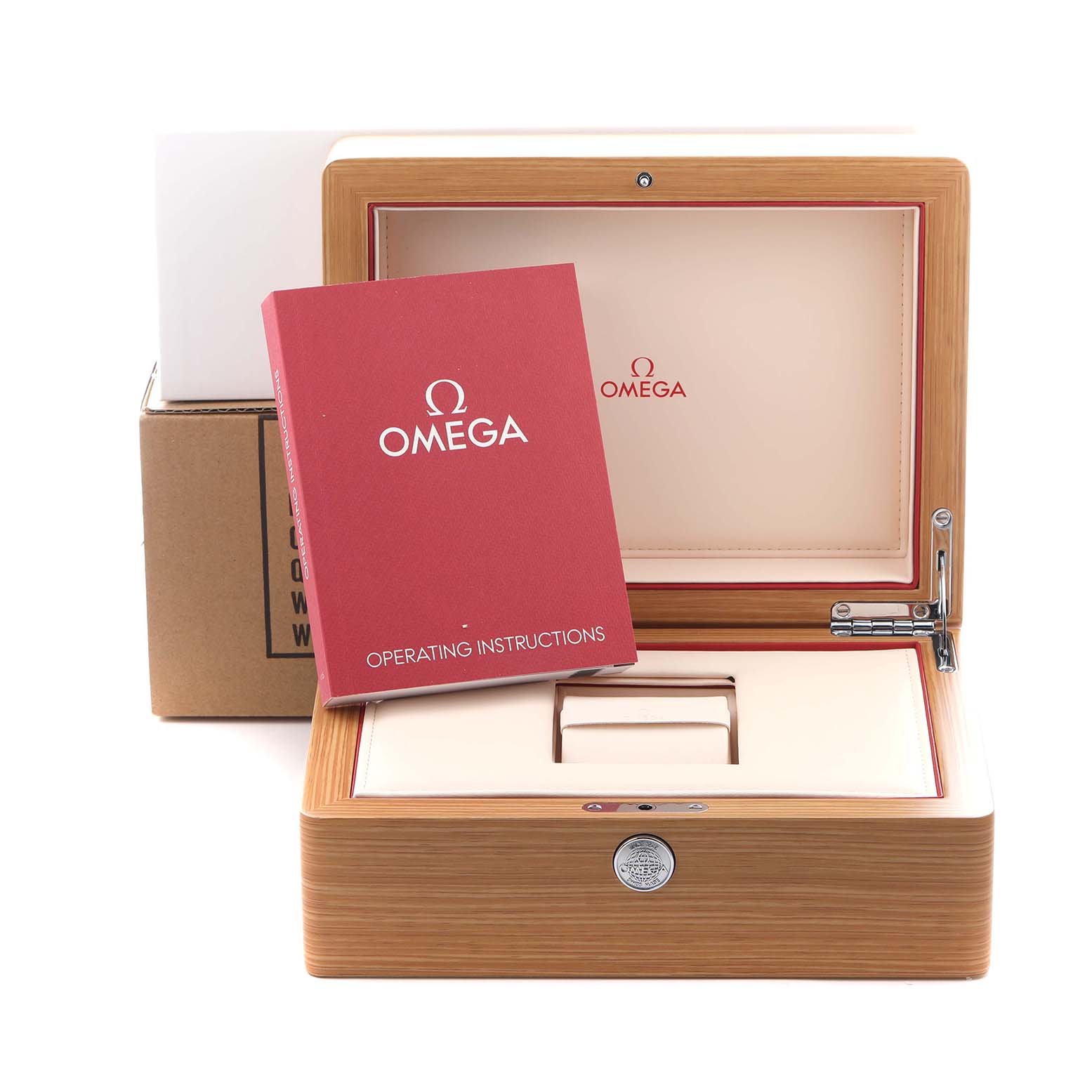 The image shows an open Omega Speedmaster 326.30.40.50.04.001 Men
s Stainless Steel White Dial 326.30.40.50.04.001 Men
s Stainless Steel White Dial watch box with a red operating instructions booklet placed on it.