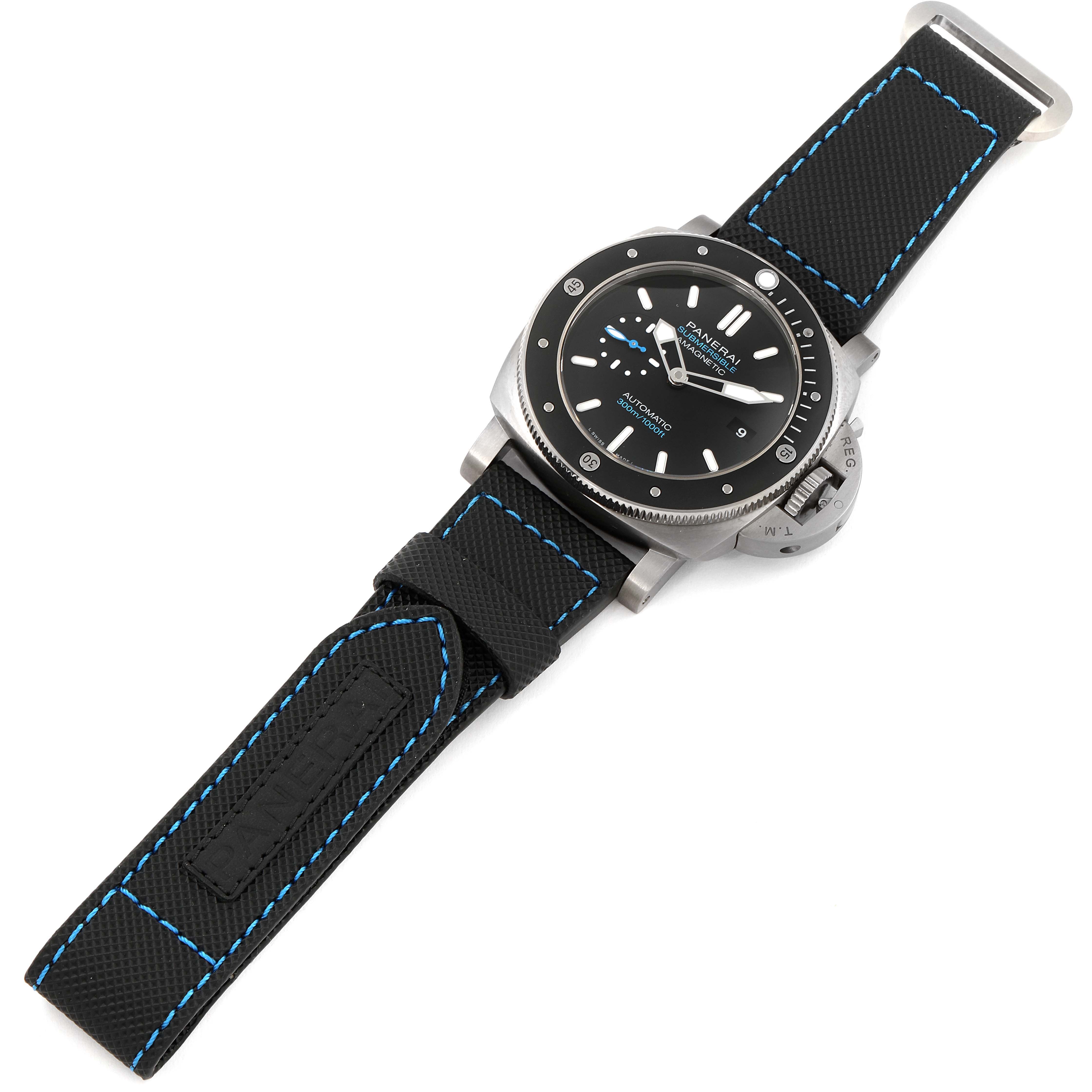 The image shows a top-down view of a Panerai Submersible PAM01389 Men's Stainless Steel Black Dial PAM01389 Men's Stainless Steel Black Dial watch featuring its face, bezel, and strap with blue stitching.