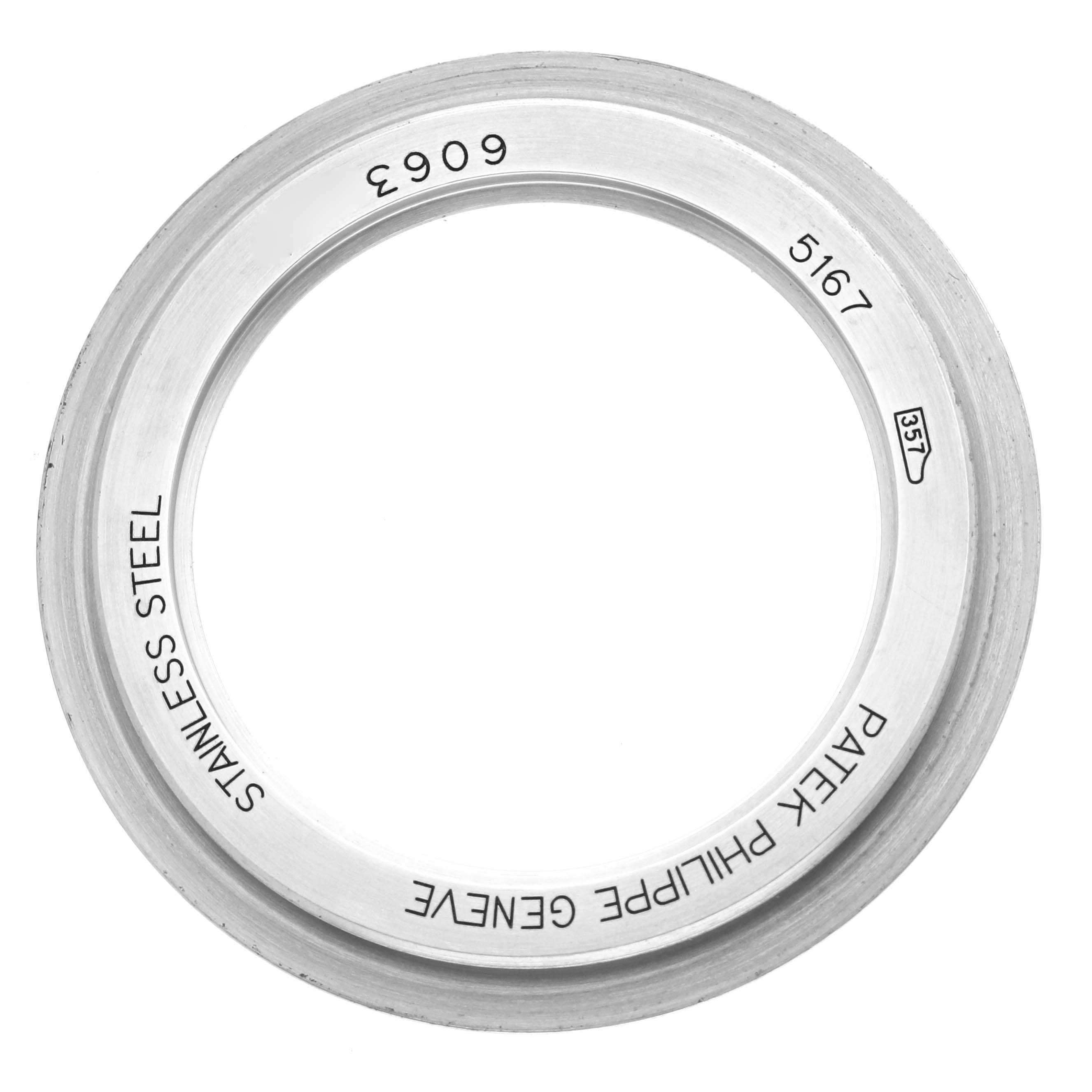 The image shows the stainless steel back casing of a Patek Philippe Aquanaut 5167A-001 Men
s Stainless Steel Black Dial 5167A-001 Men
s Stainless Steel Black Dial watch, viewed from above.